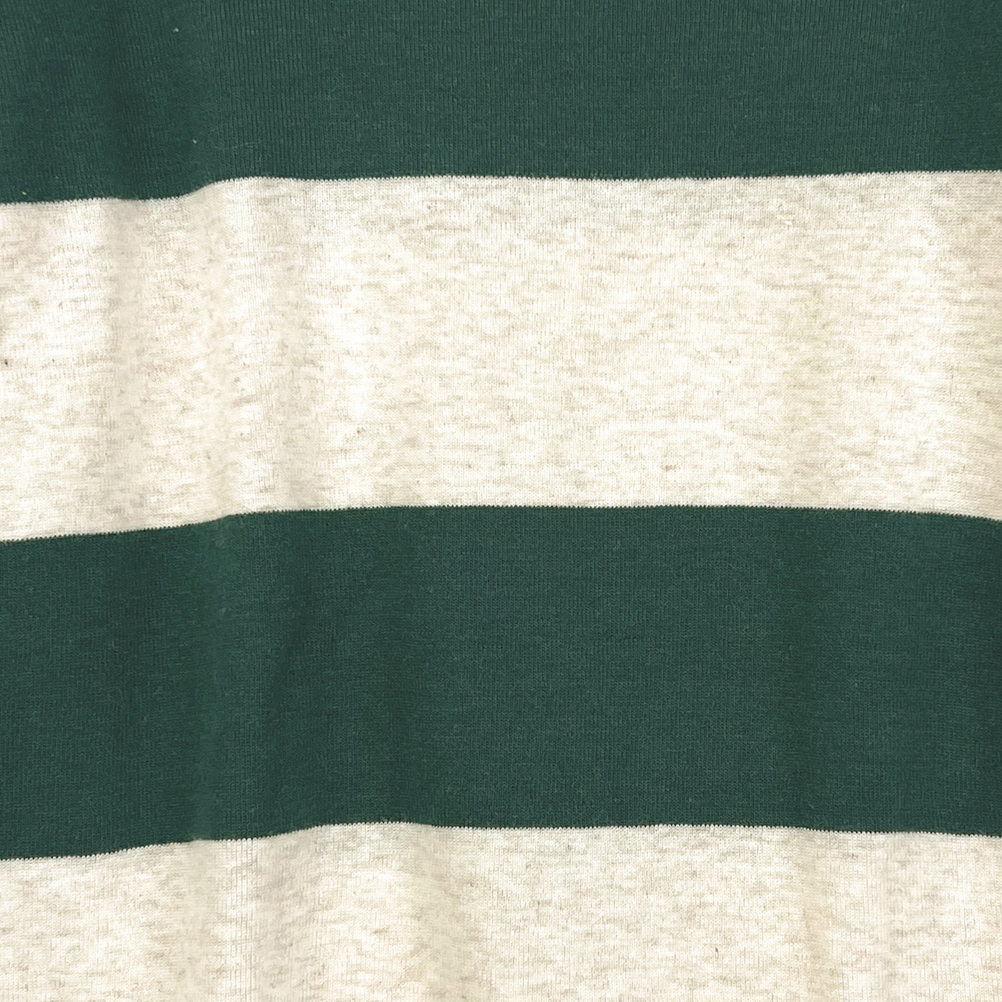 Close-up of green and beige striped fabric