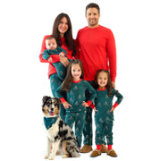 Family of five wearing matching red and green pajamas with a dog on a white background