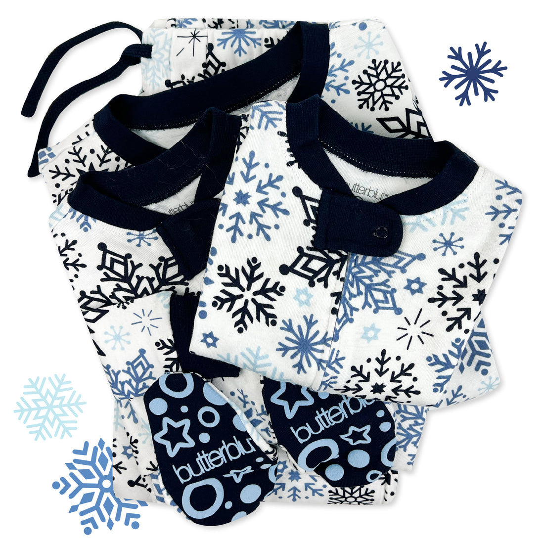 Matching family pajamas with a snowflake pattern on a white background.