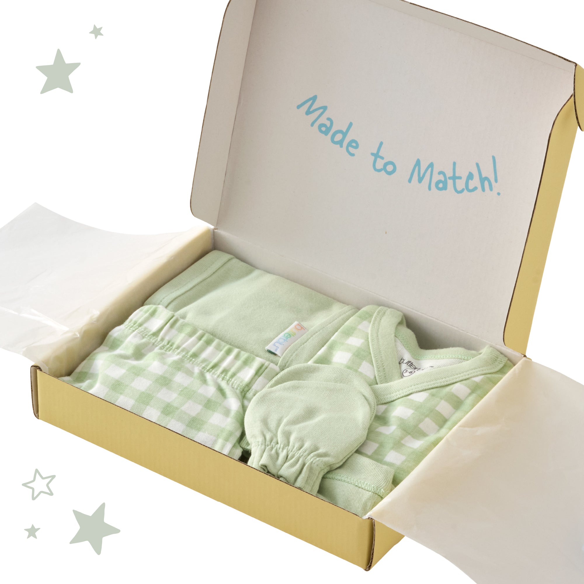 Green baby outfit set in an open box with 'Made to Match!' text.