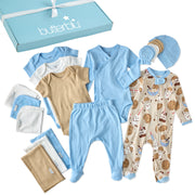 Collection of baby clothes including onesies, rompers, and hats with a 'butterblu' box.