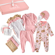 Collection of baby clothes including onesies, pants, and a hat on a white background with 'butterblu' branding.