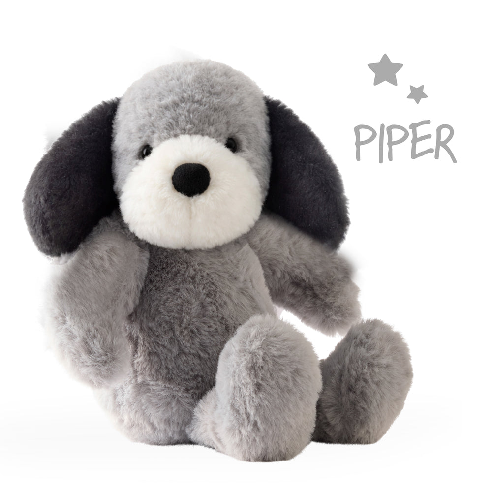 Gray plush dog toy named 'Piper' on a white background