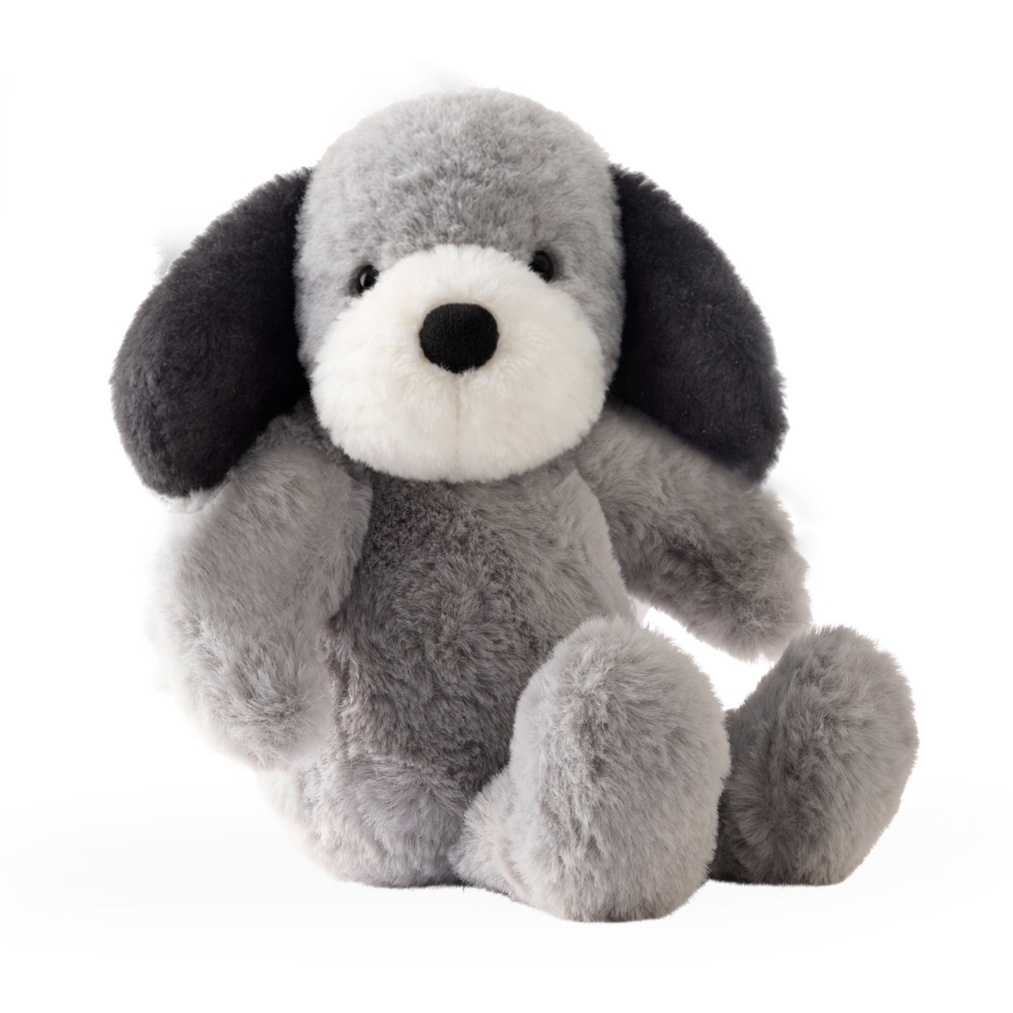 Gray plush dog toy on a white background