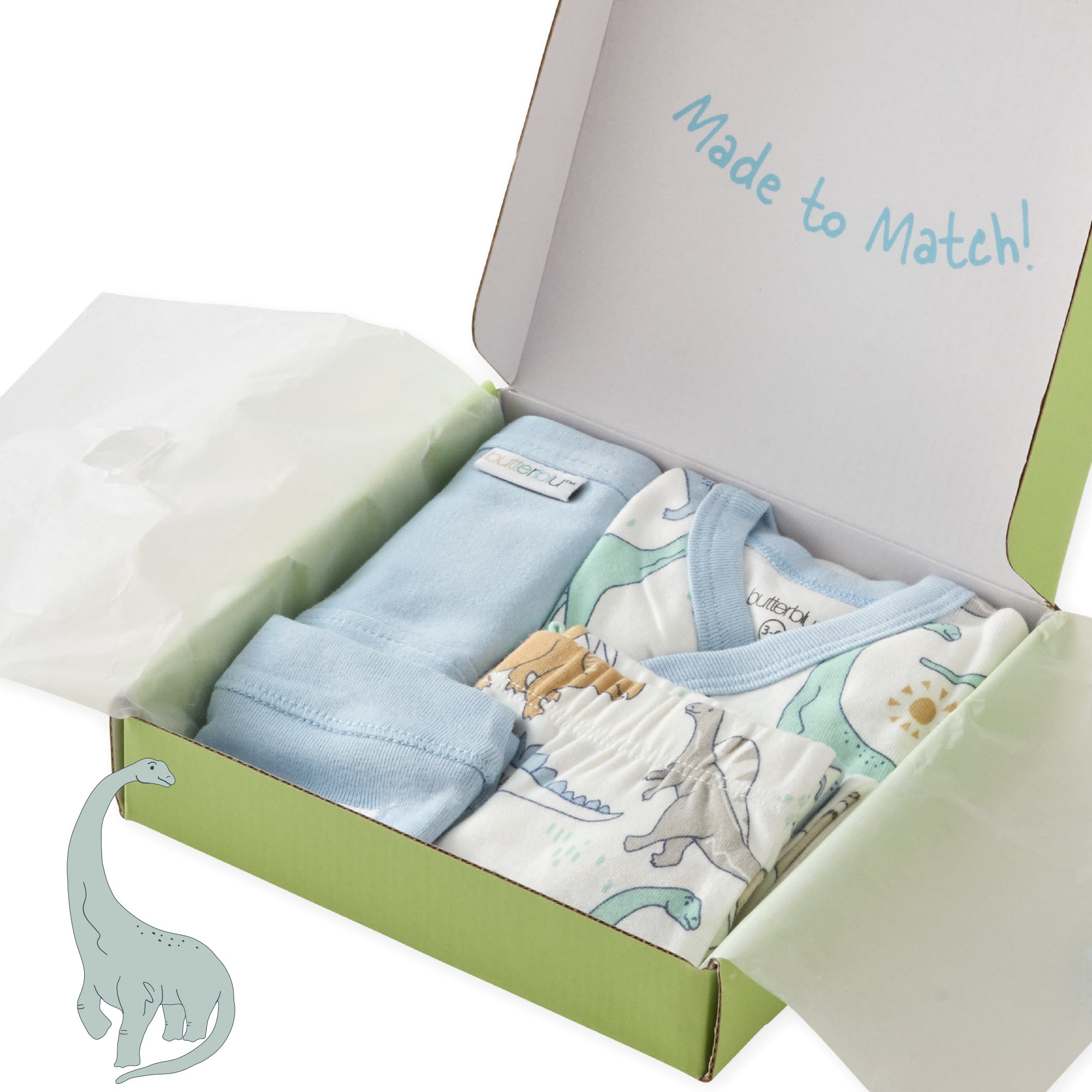 Box of baby clothes with dinosaur design, labeled 'Made to Match'.