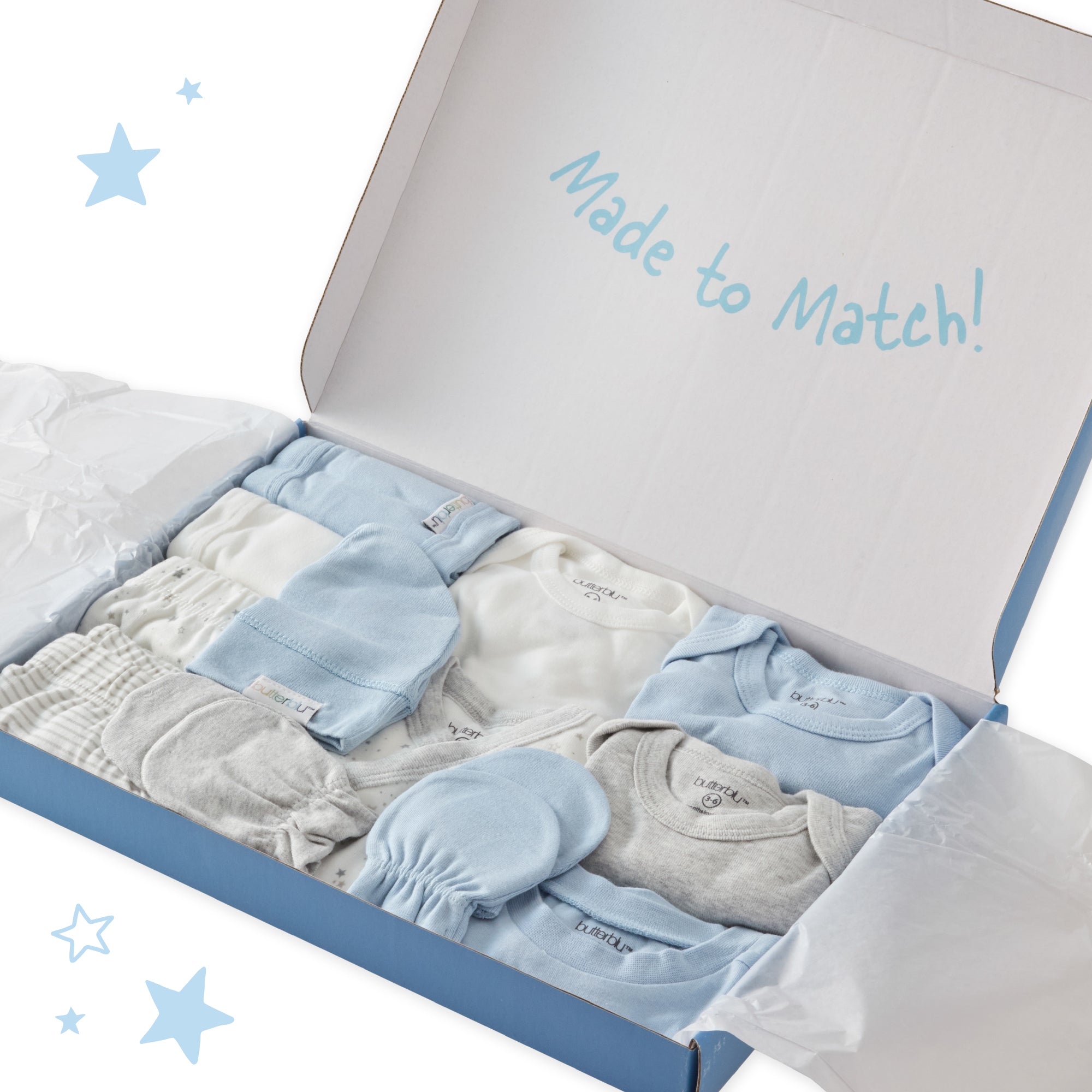 Baby clothing set in a box with 'Made to Match!' text and star decorations.