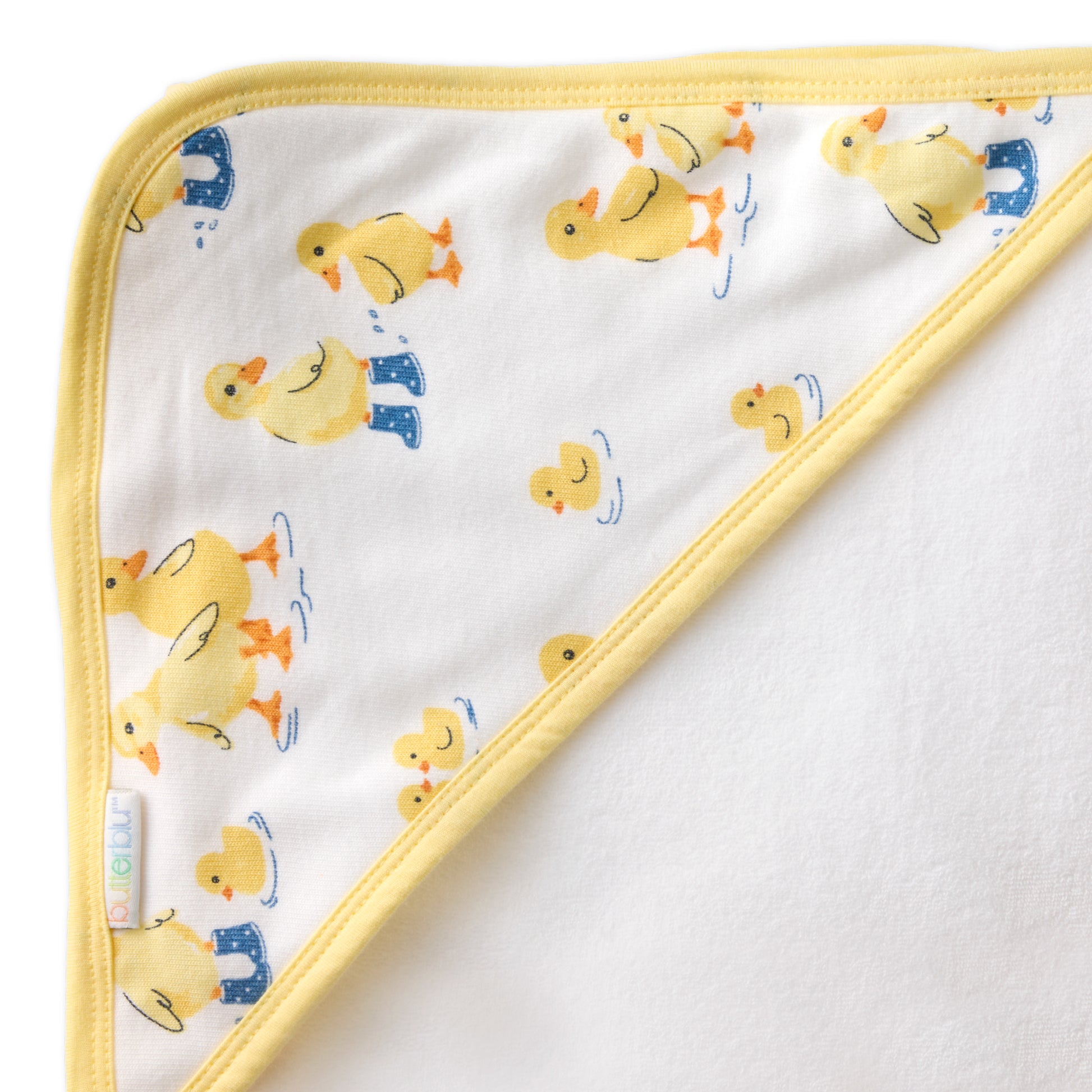 Close up of hood on towel with butterblu tag on towel