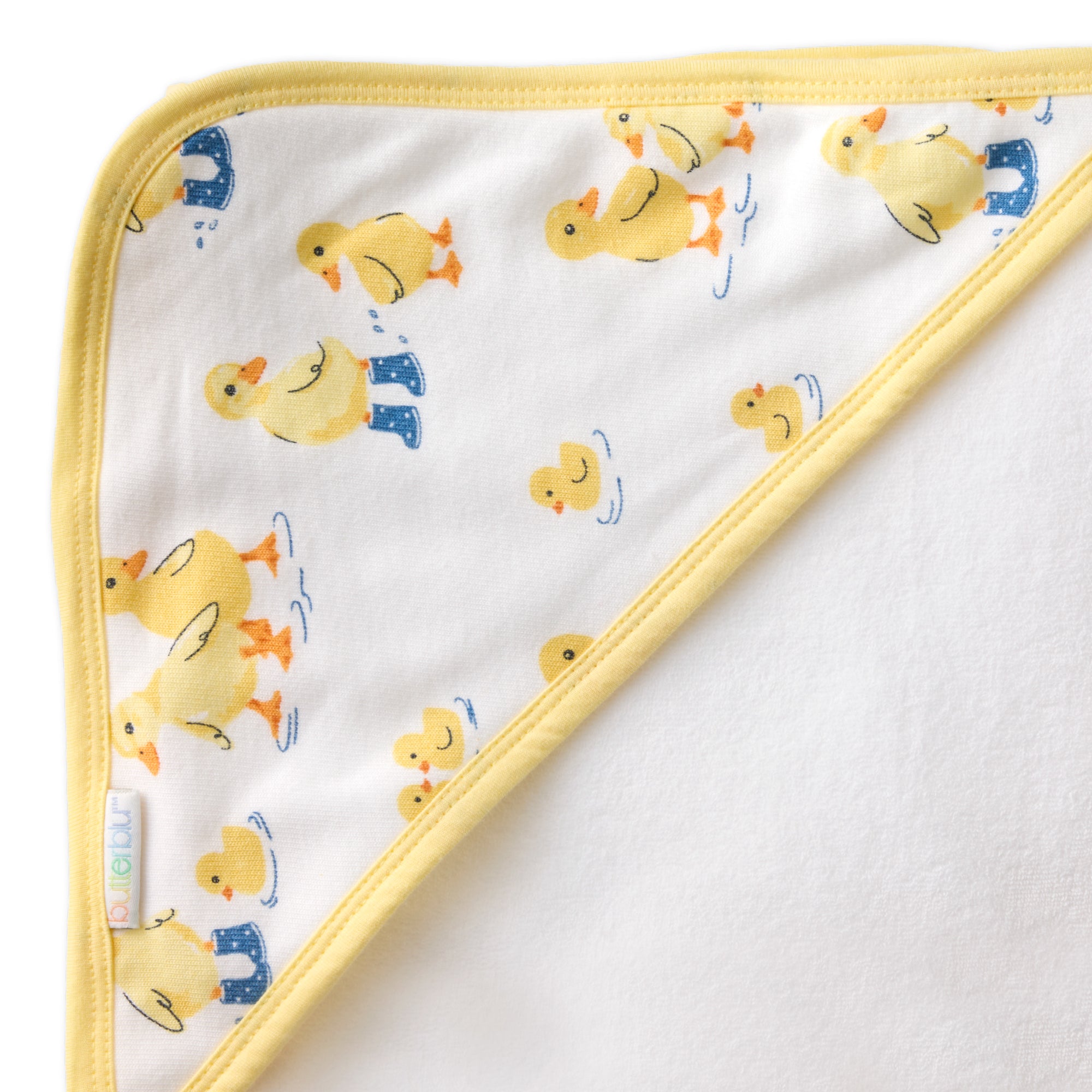 Close up of hood on towel with butterblu tag on towel