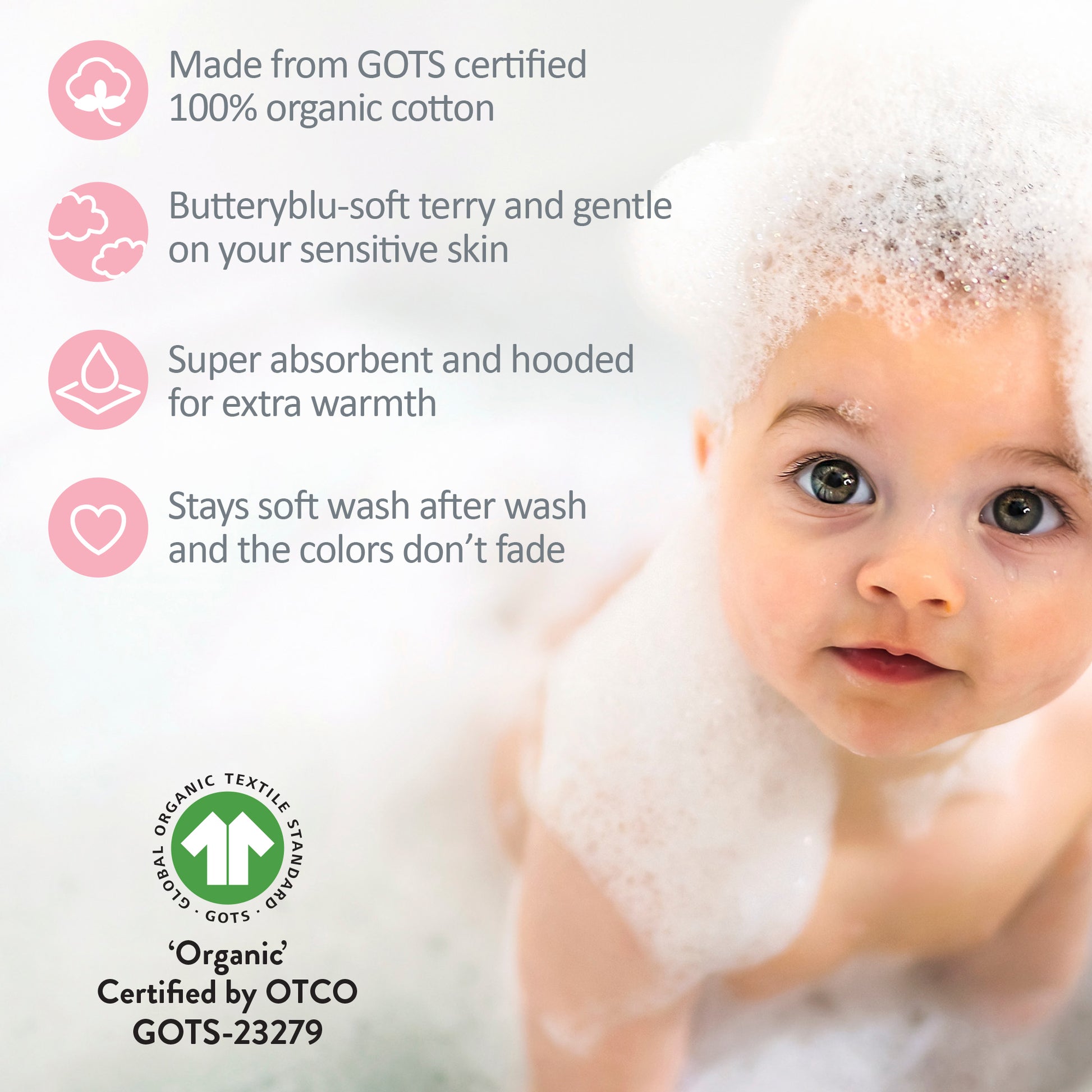 Baby with GOTS certification badges
