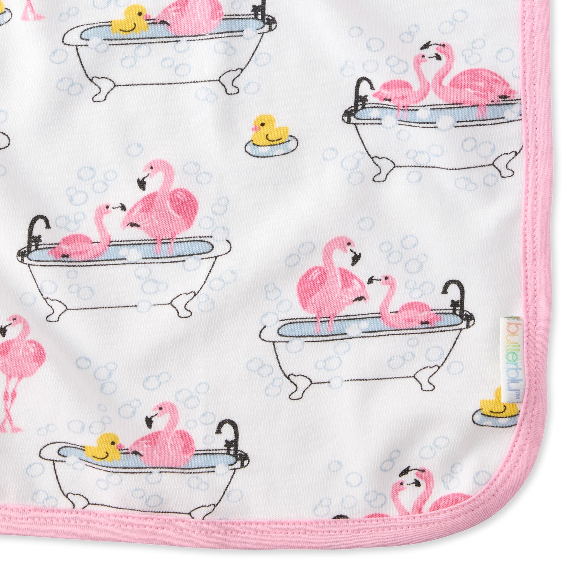 Close up of Fab Flamingo print on River washcloth and butterblu tag