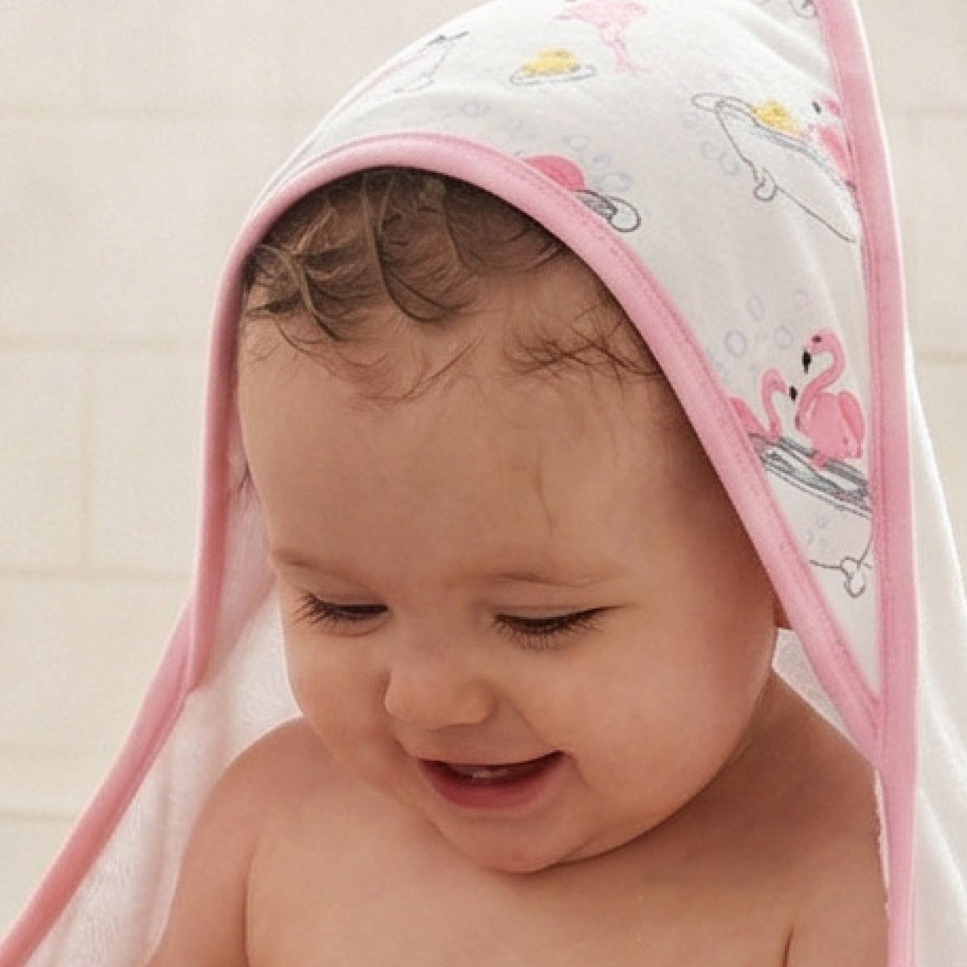 Baby in hooded towel