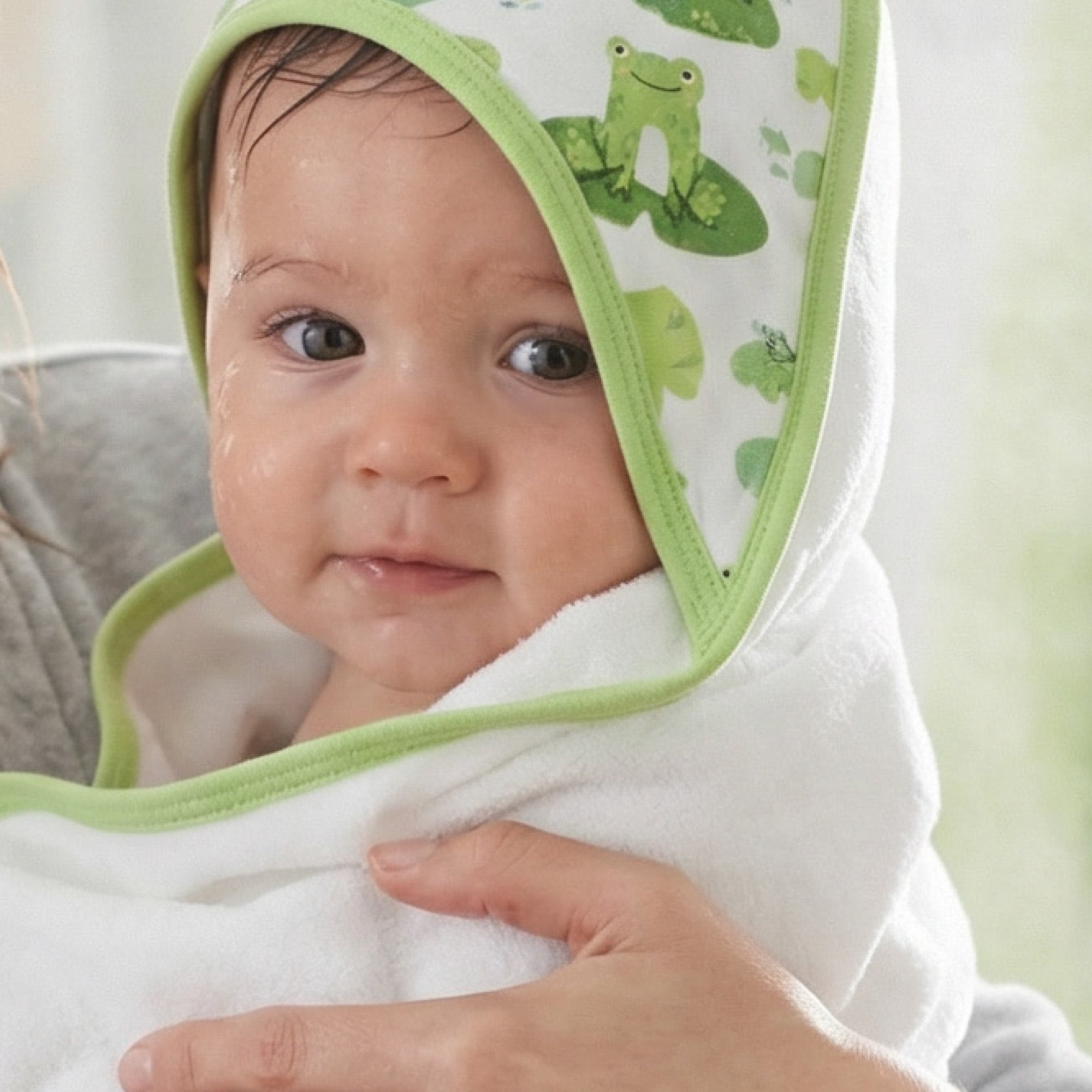 Baby in hooded towel