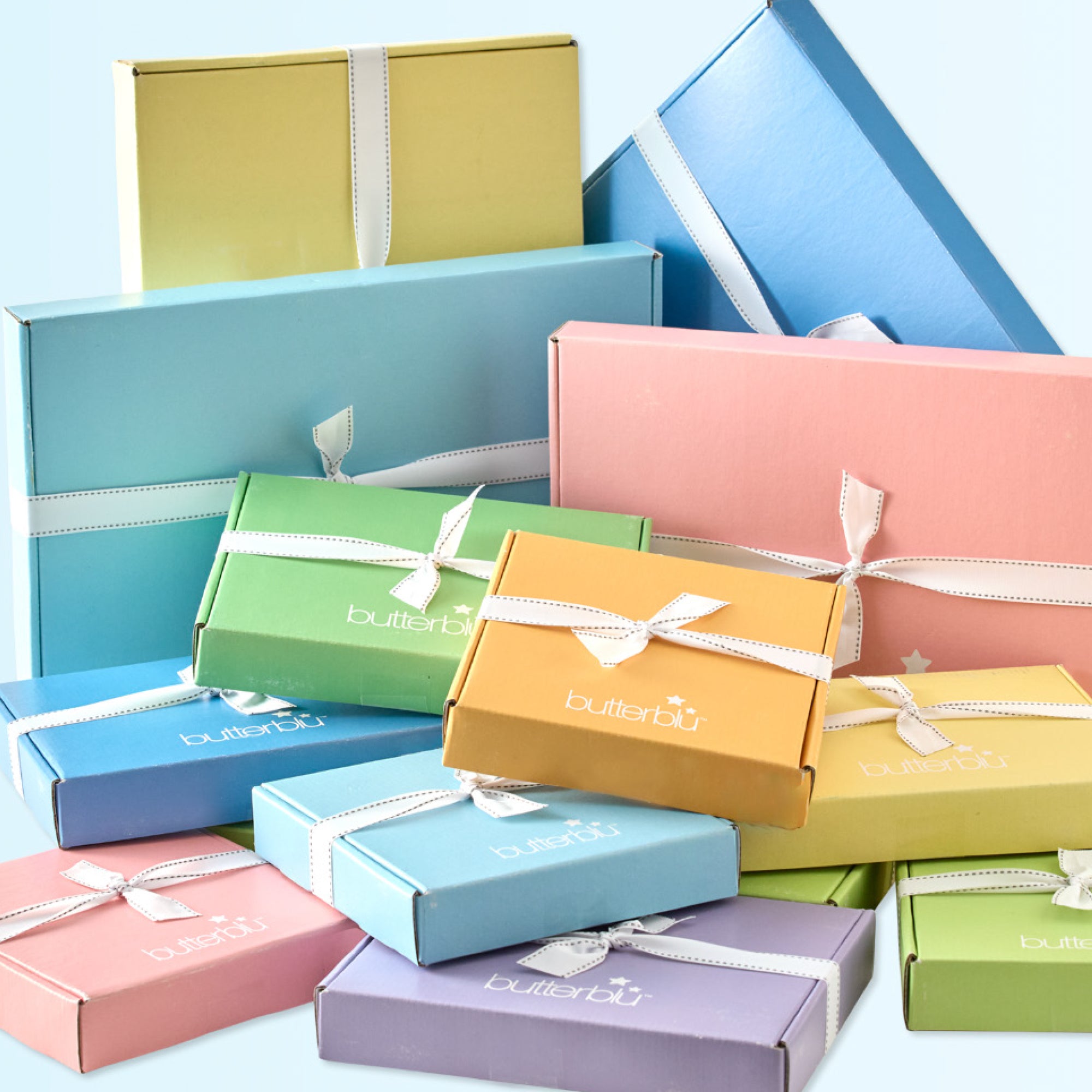 Assortment of colorful  Butterblu gift boxes 
