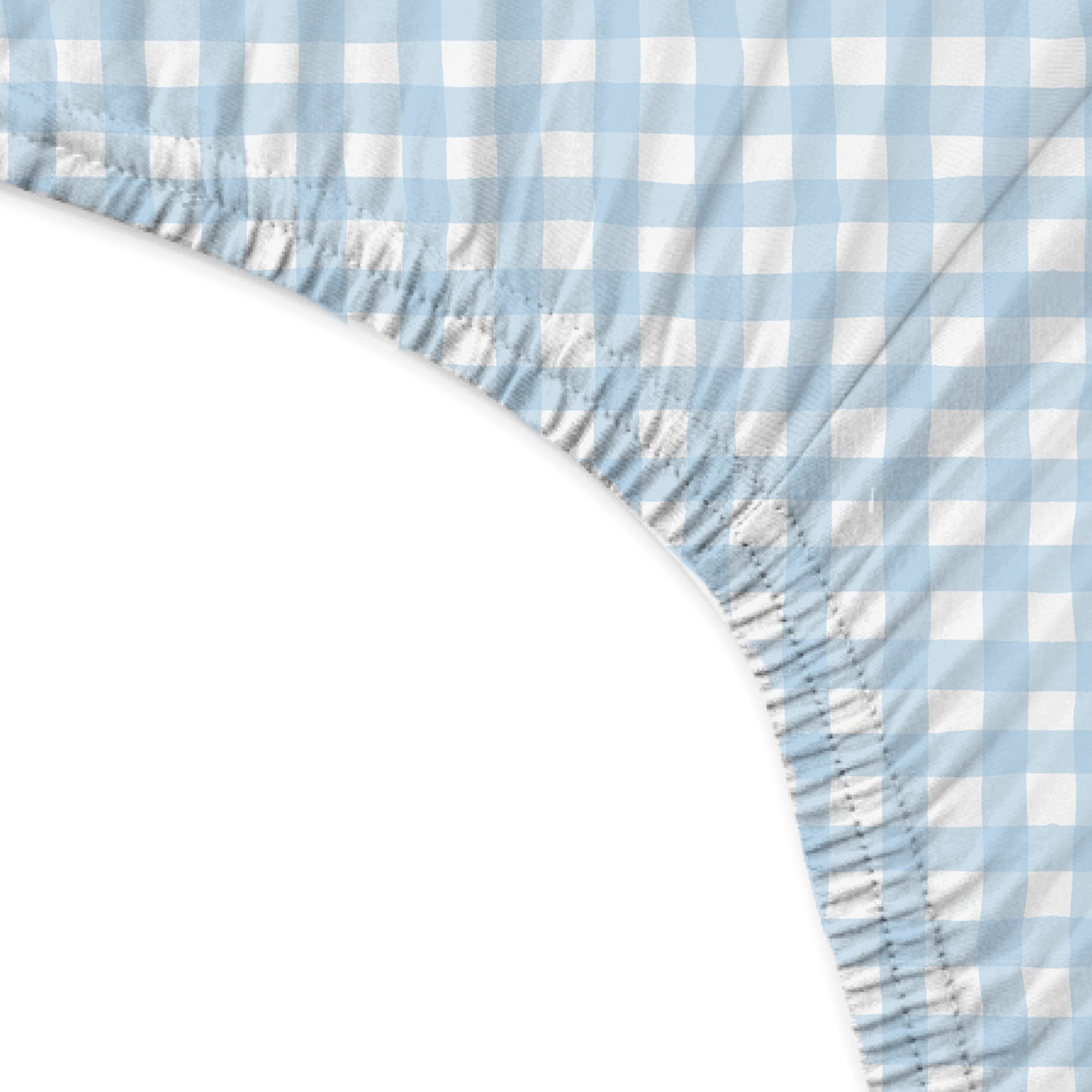 Blue and white checkered fitted sheet corner on a white background