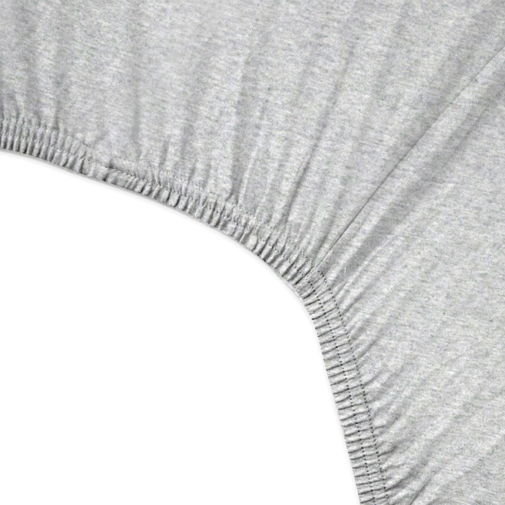 Close-up of a gray fitted sheet corner on a white background