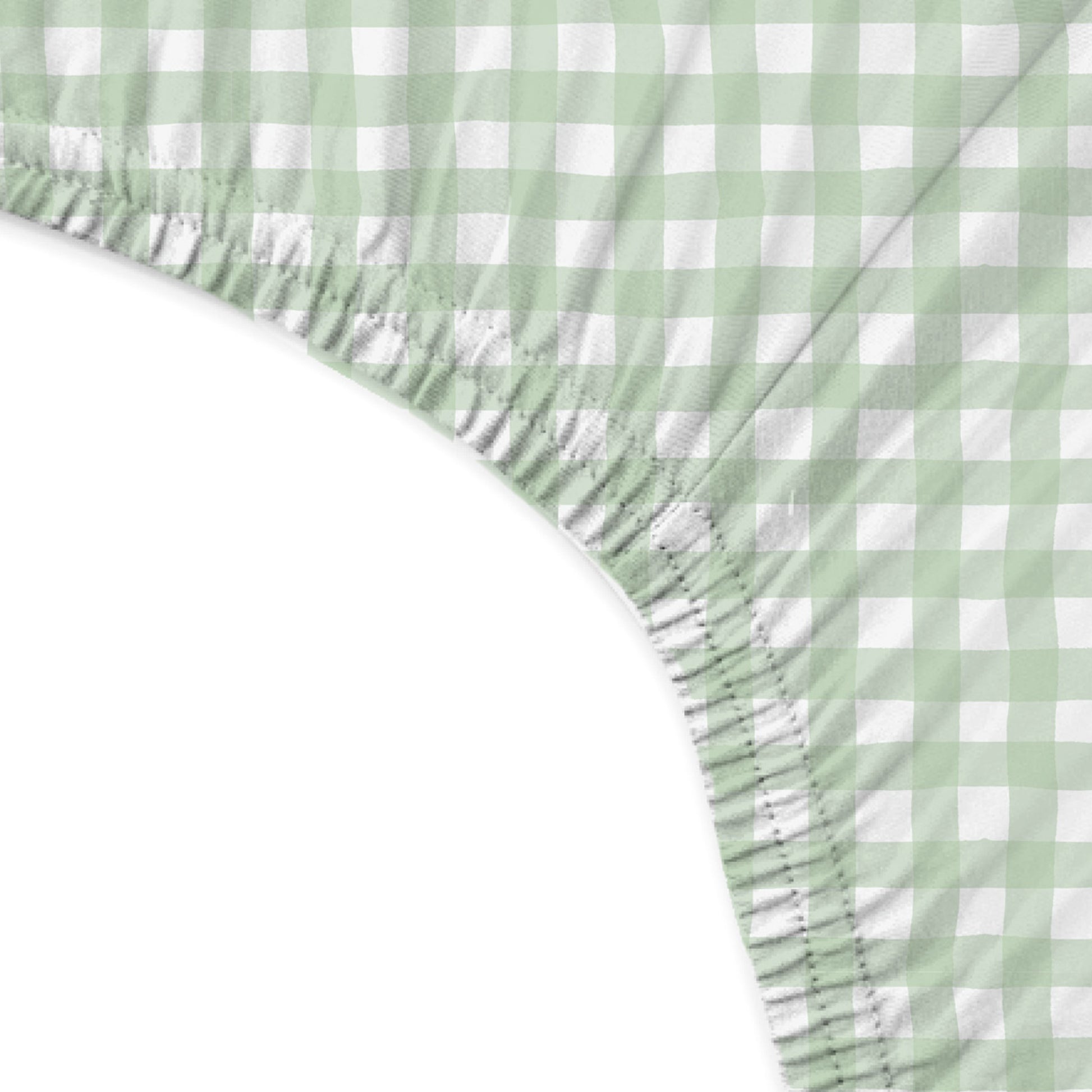 Green and white checkered fabric with a ruffled edge on a white background