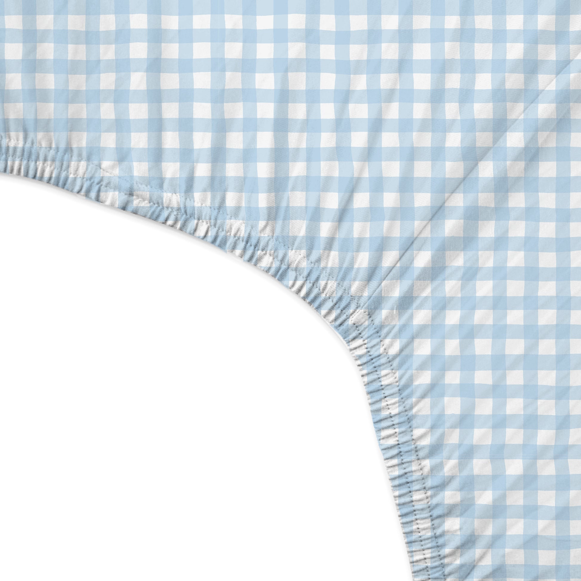 Blue and white checkered fitted sheet on a bed
