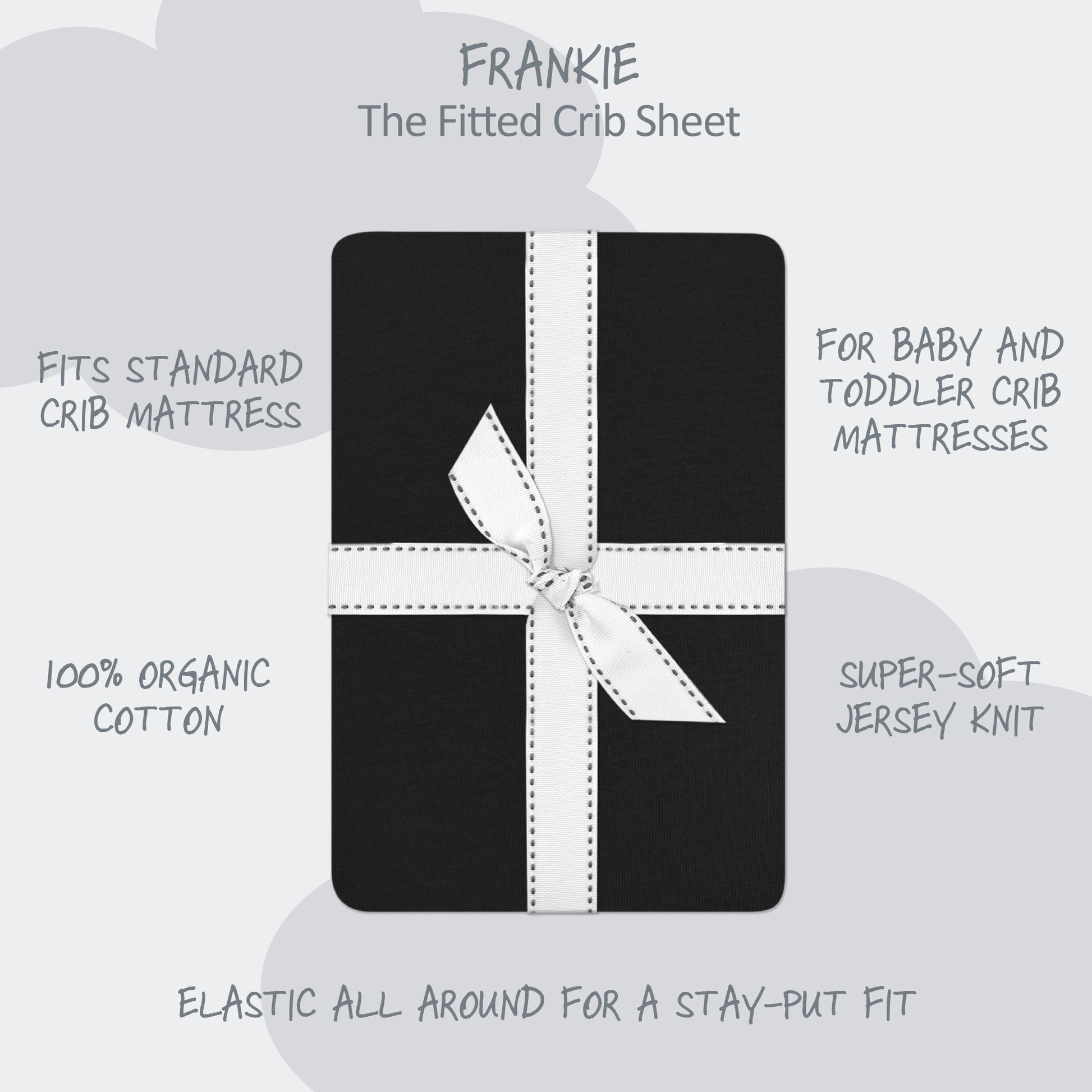 Black crib sheet with white ribbon packaging on a light gray background, featuring product details.