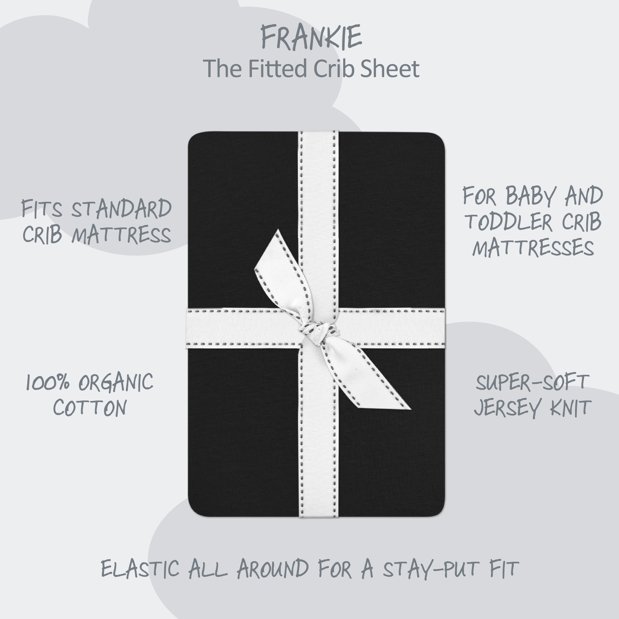 Black crib sheet with white ribbon packaging on a light gray background, featuring product details.