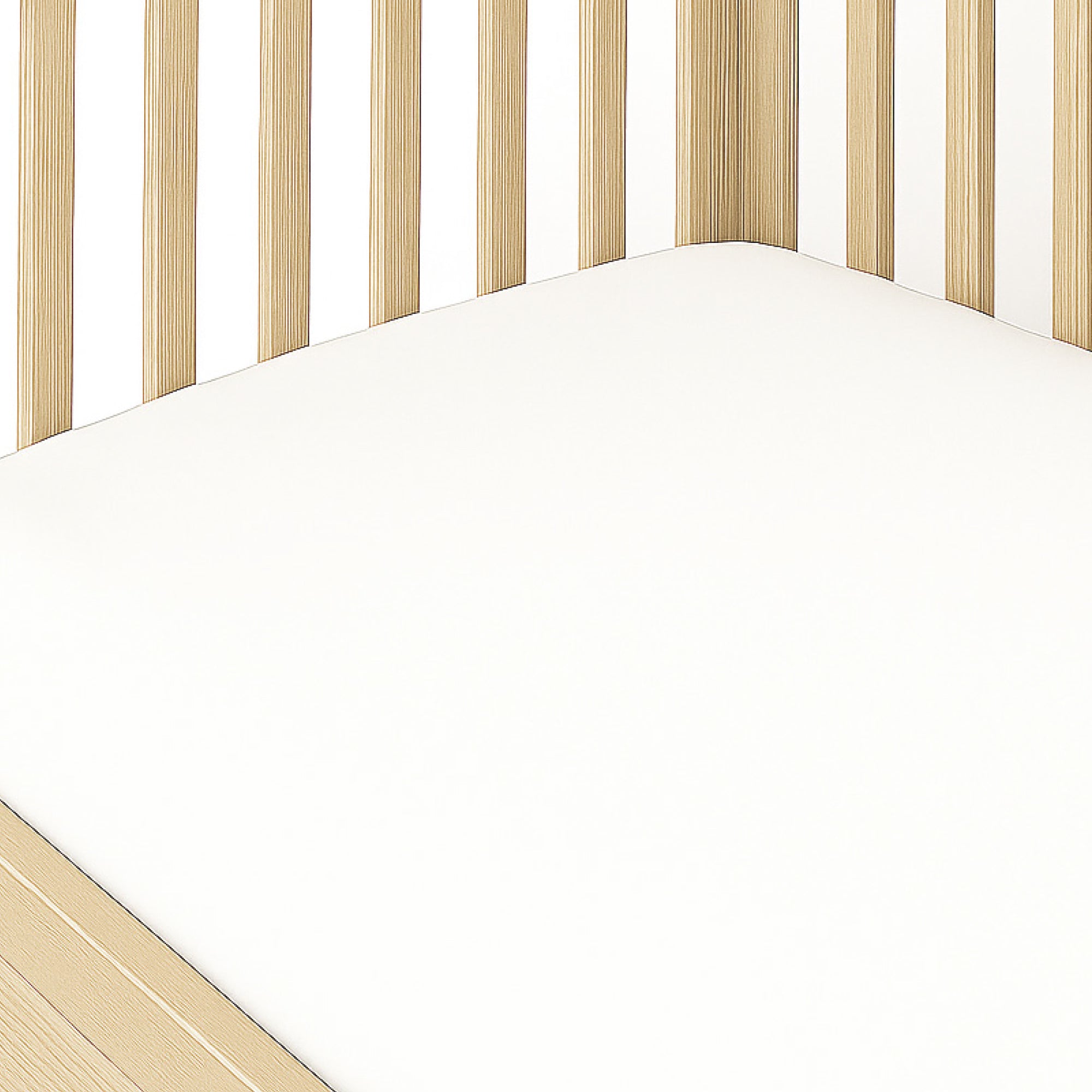 White crib mattress with wooden sides on a white background