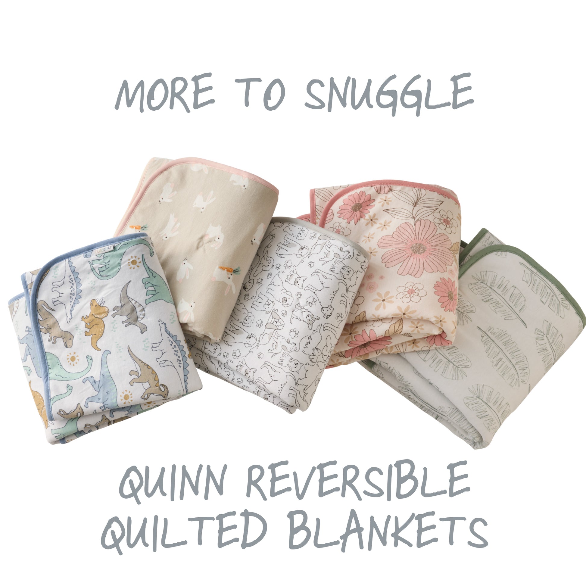 Set of Quinn reversible quilted blankets with various patterns on a white background.