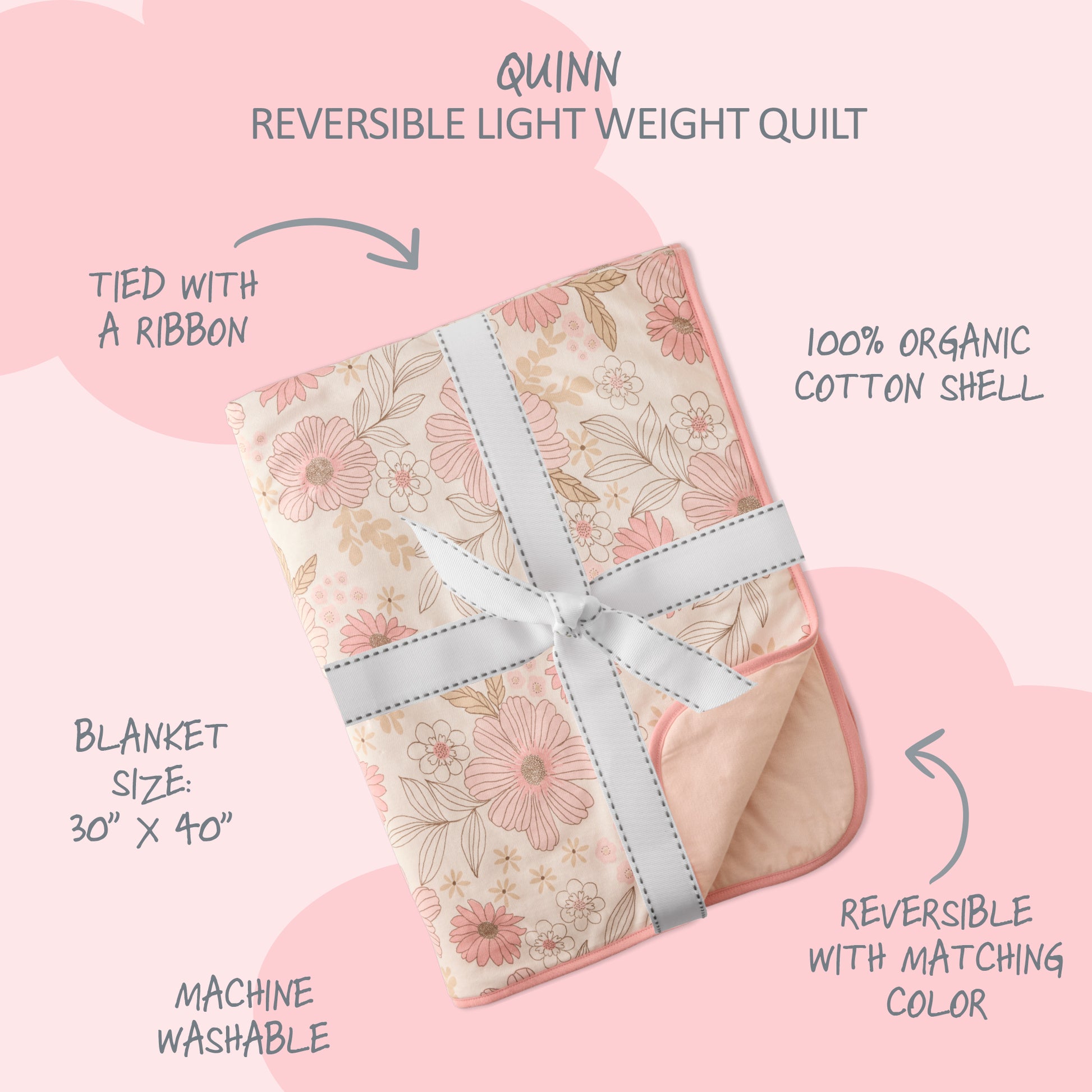 Reversible lightweight quilt with floral pattern tied with a ribbon on a pink background