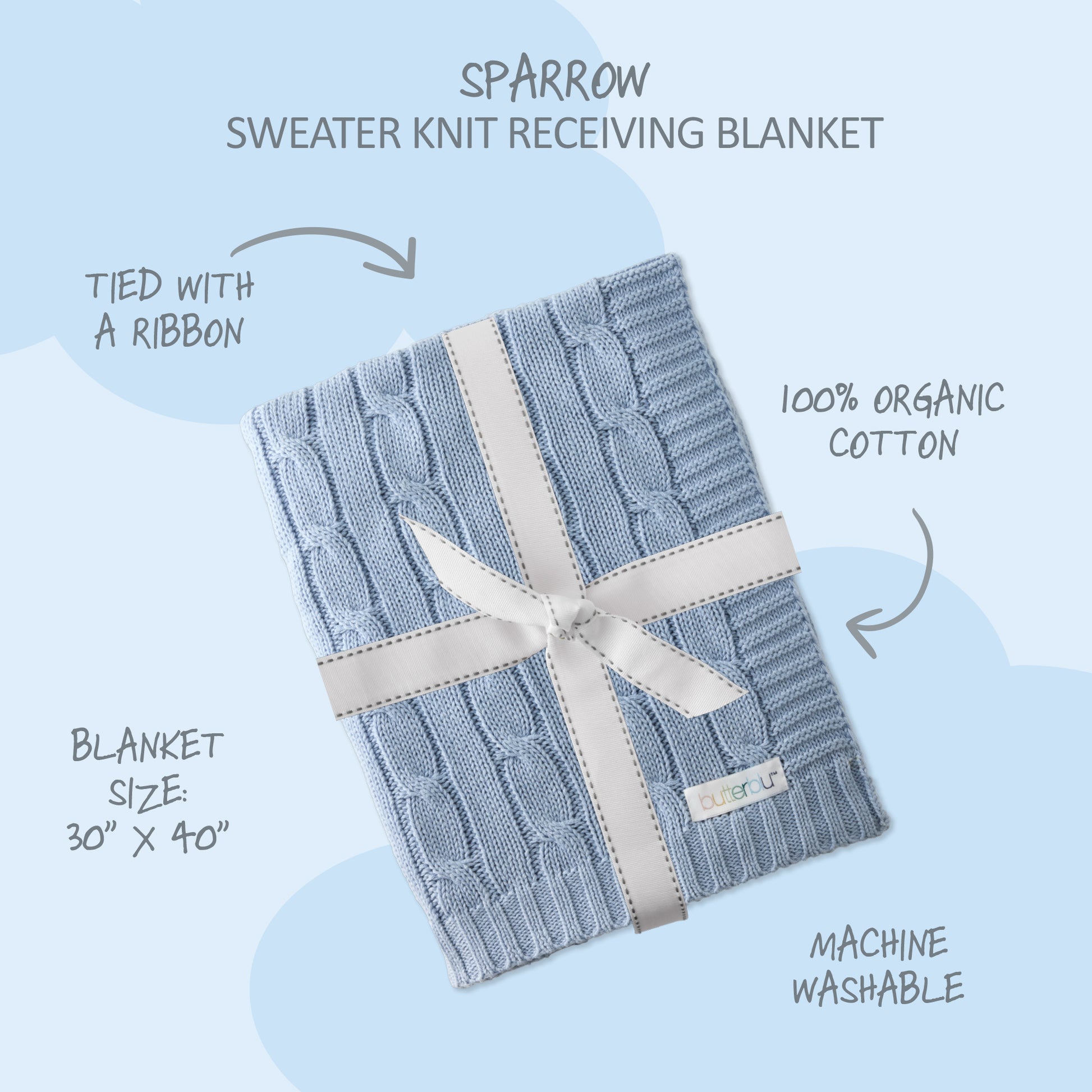 Blue sweater knit receiving blanket with a ribbon on a light blue background