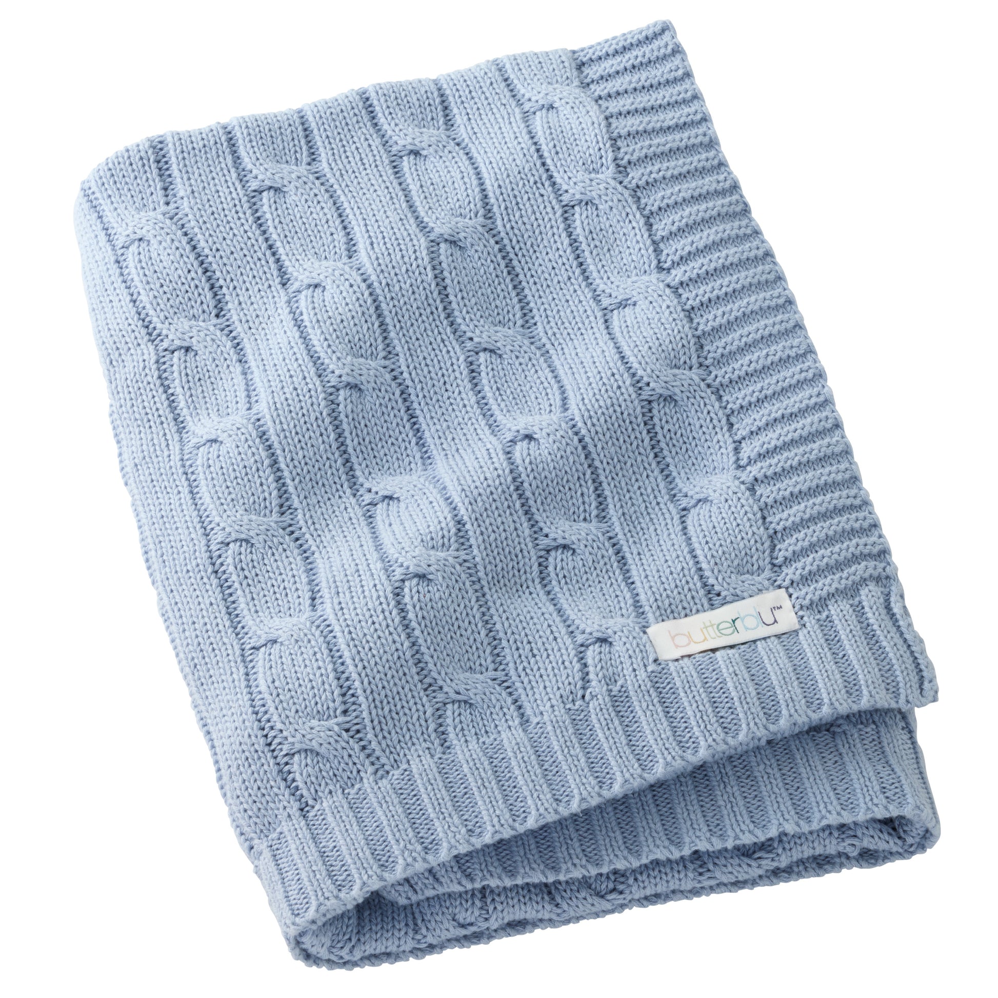 Folded blue knitted blanket with a brand label on a white background