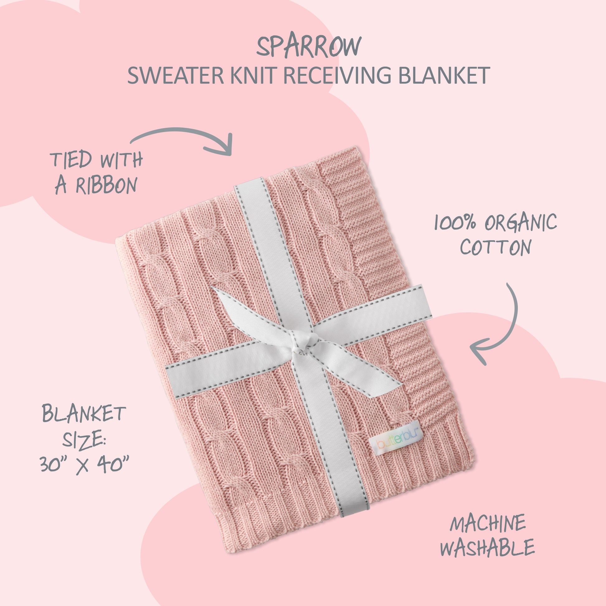 Pink sweater knit receiving blanket with a ribbon on a pink background