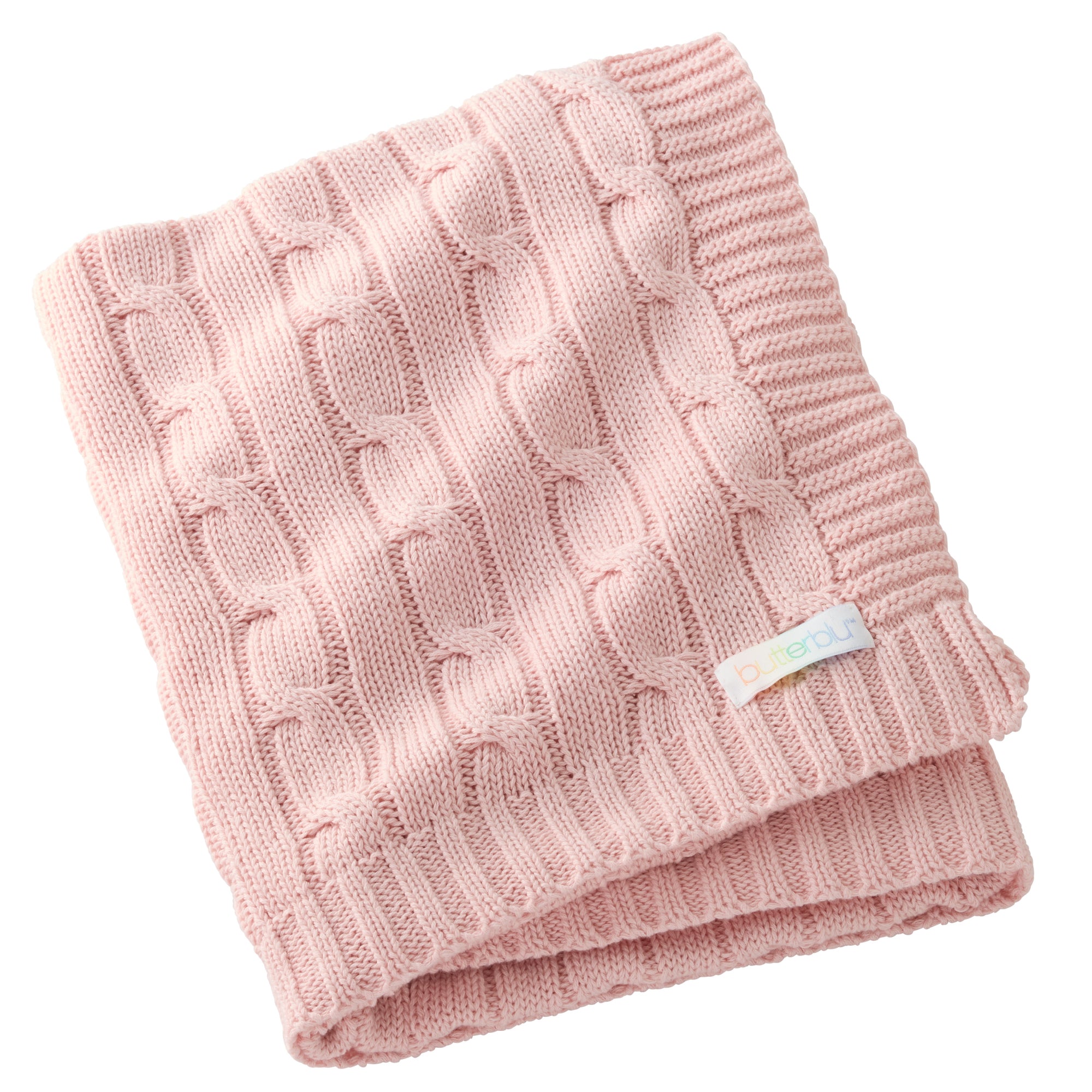 Pink knitted blanket with a visible brand label on a white background