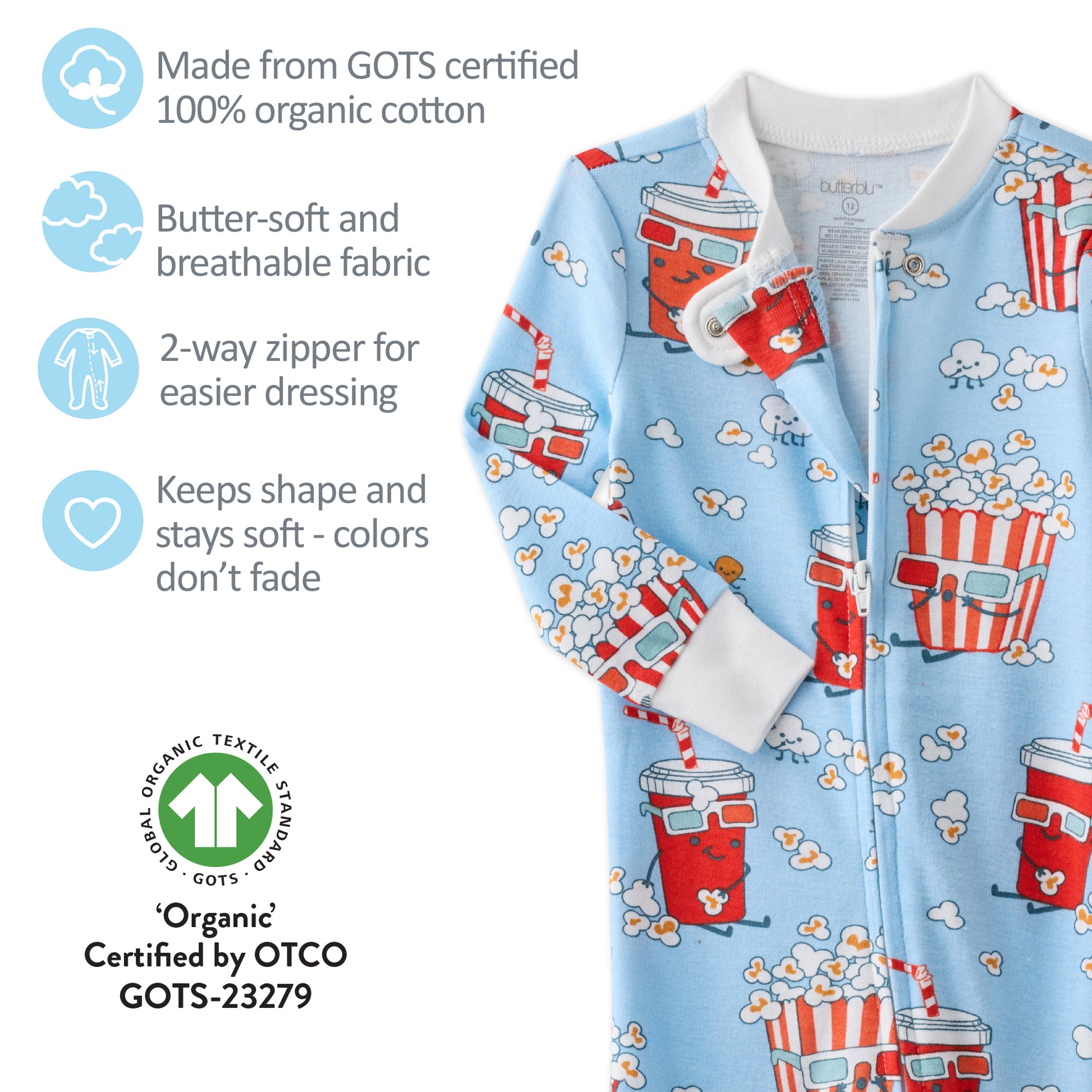 Children's pajama with popcorn and soda pattern on a light blue background, featuring GOTS certification details.