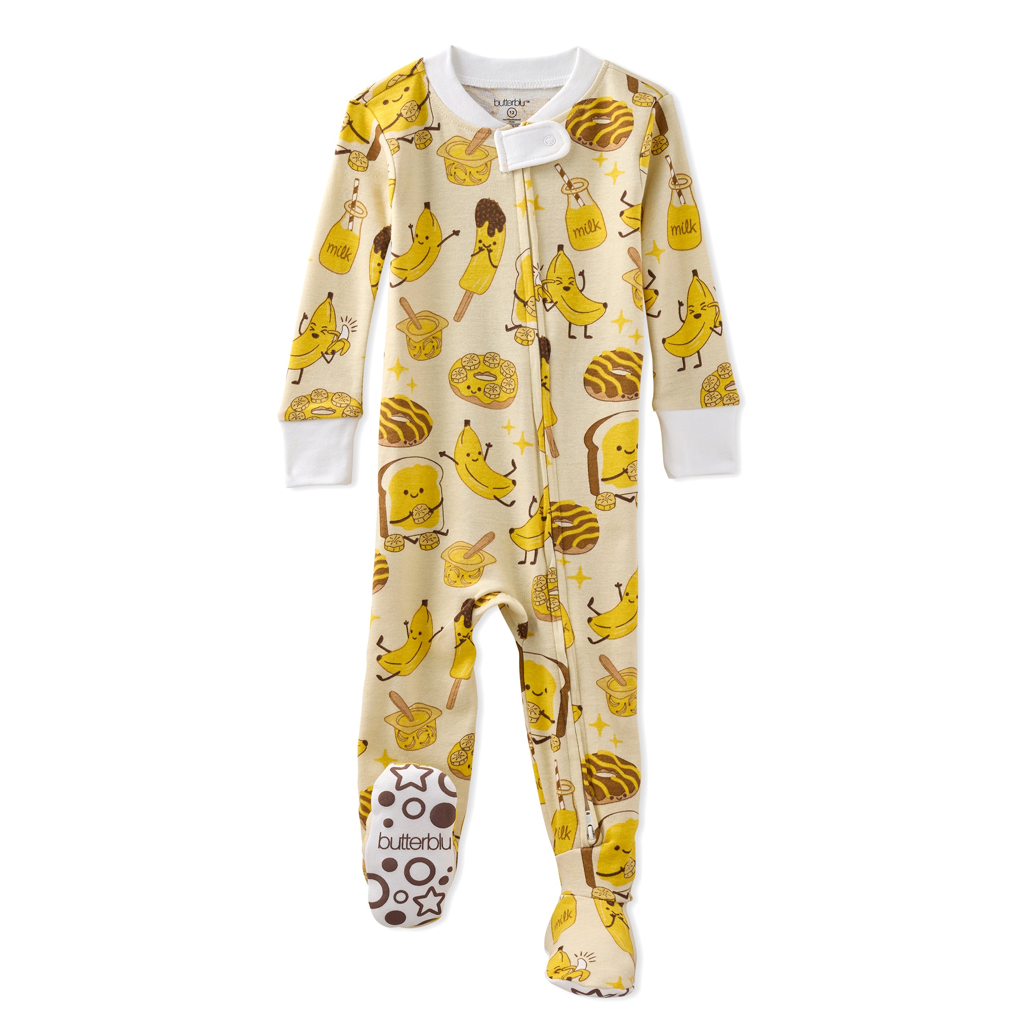 Children's onesie with banana and related items pattern on a white background