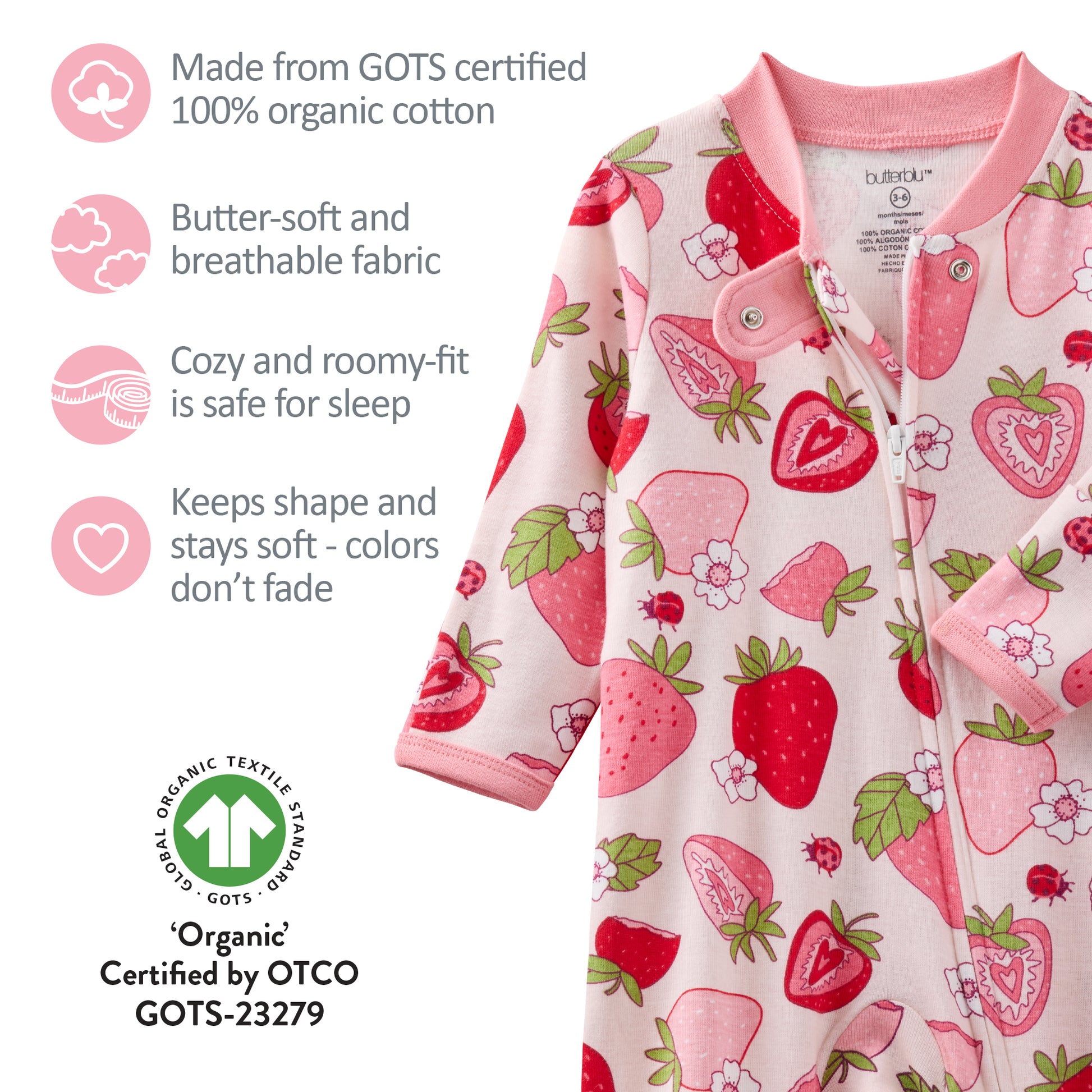 Baby onesie with strawberry pattern and certification details on a white background