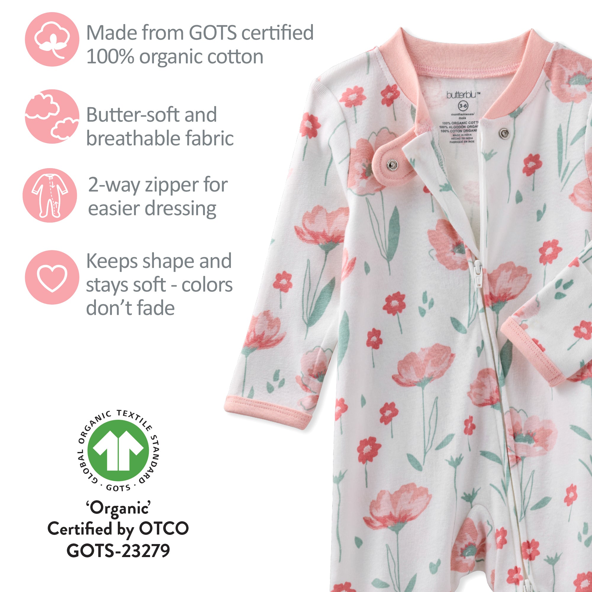 Floral baby onesie with certification details on a white background