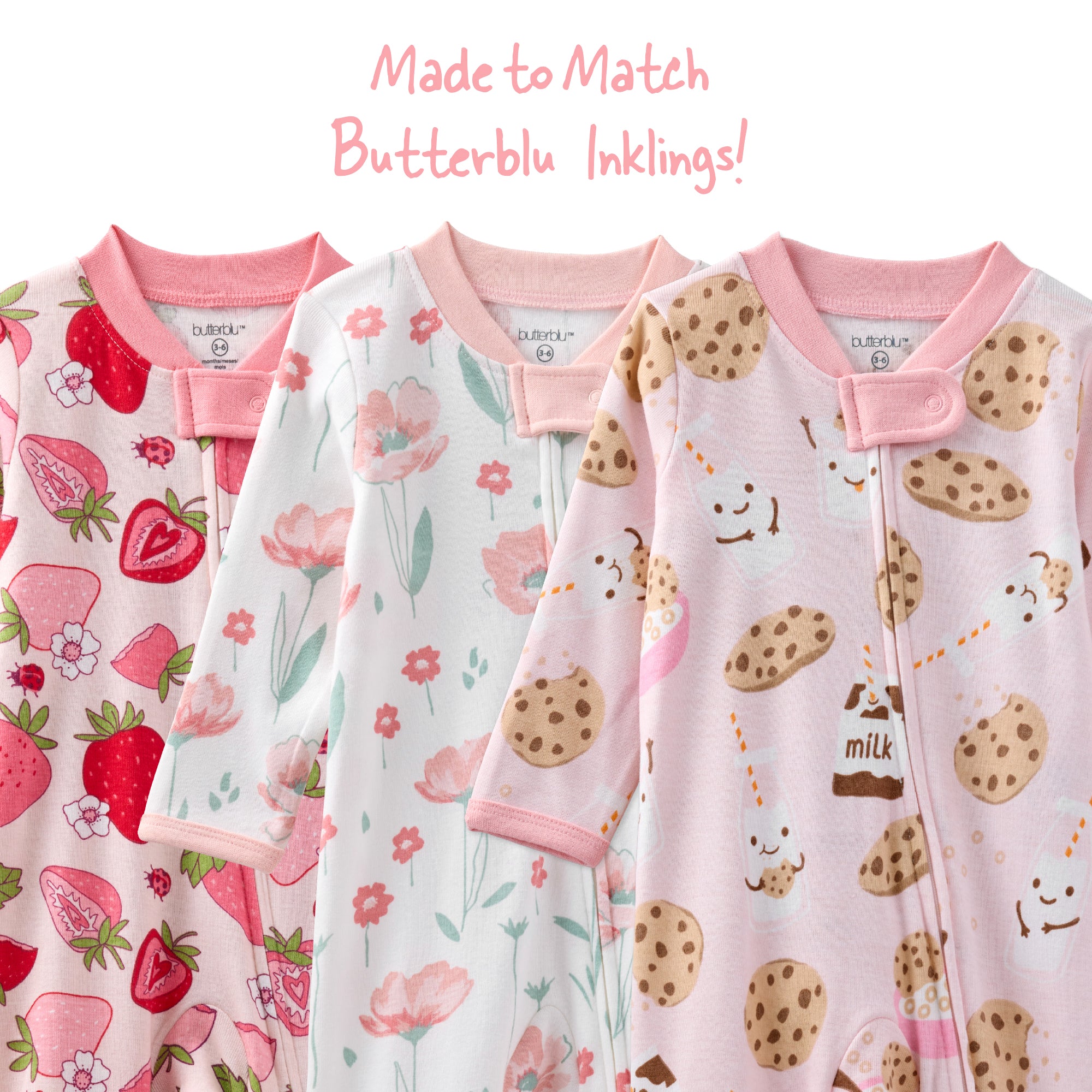 Three baby rompers with different patterns on a white background