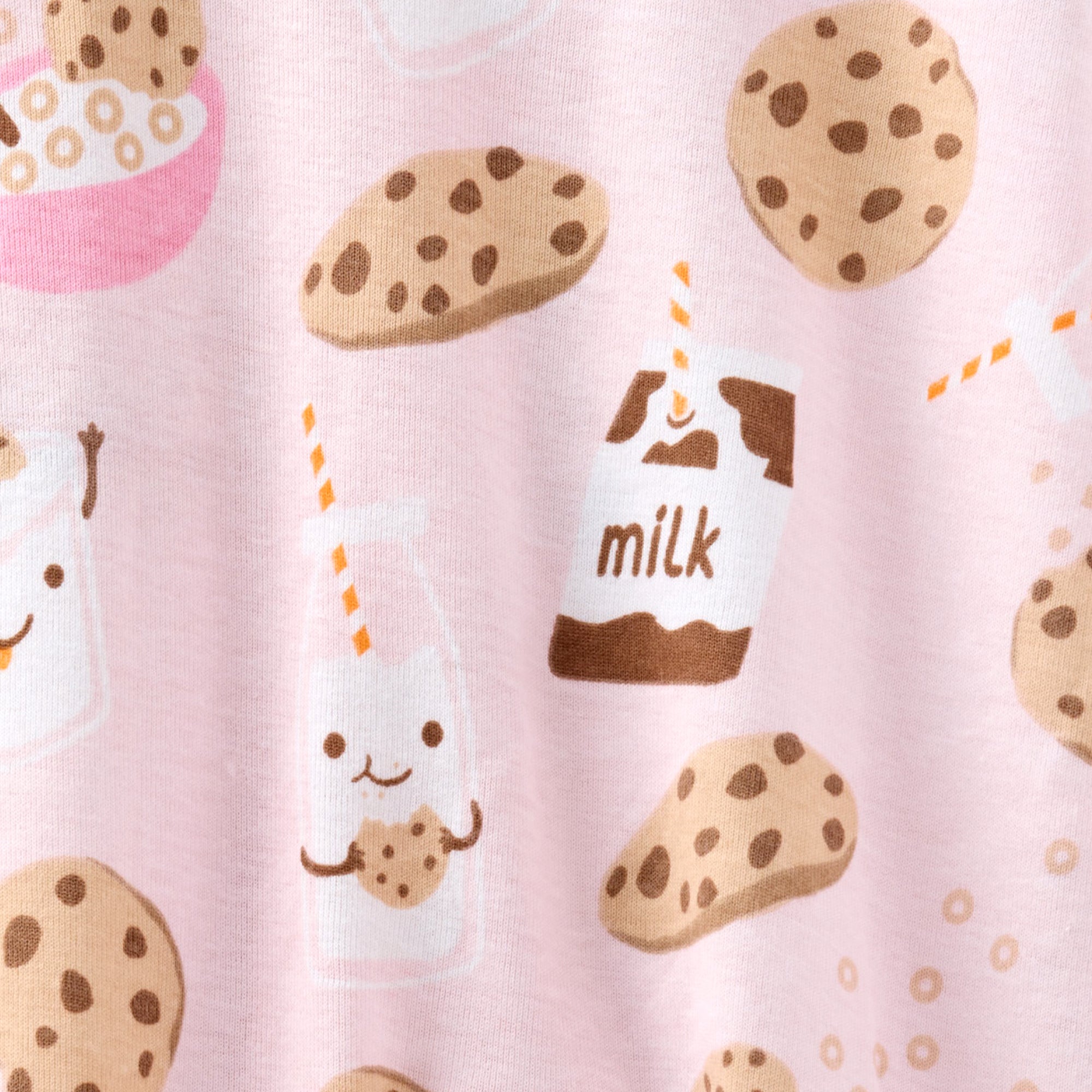 Fabric with cartoon cookies and milk bottle on a pink background