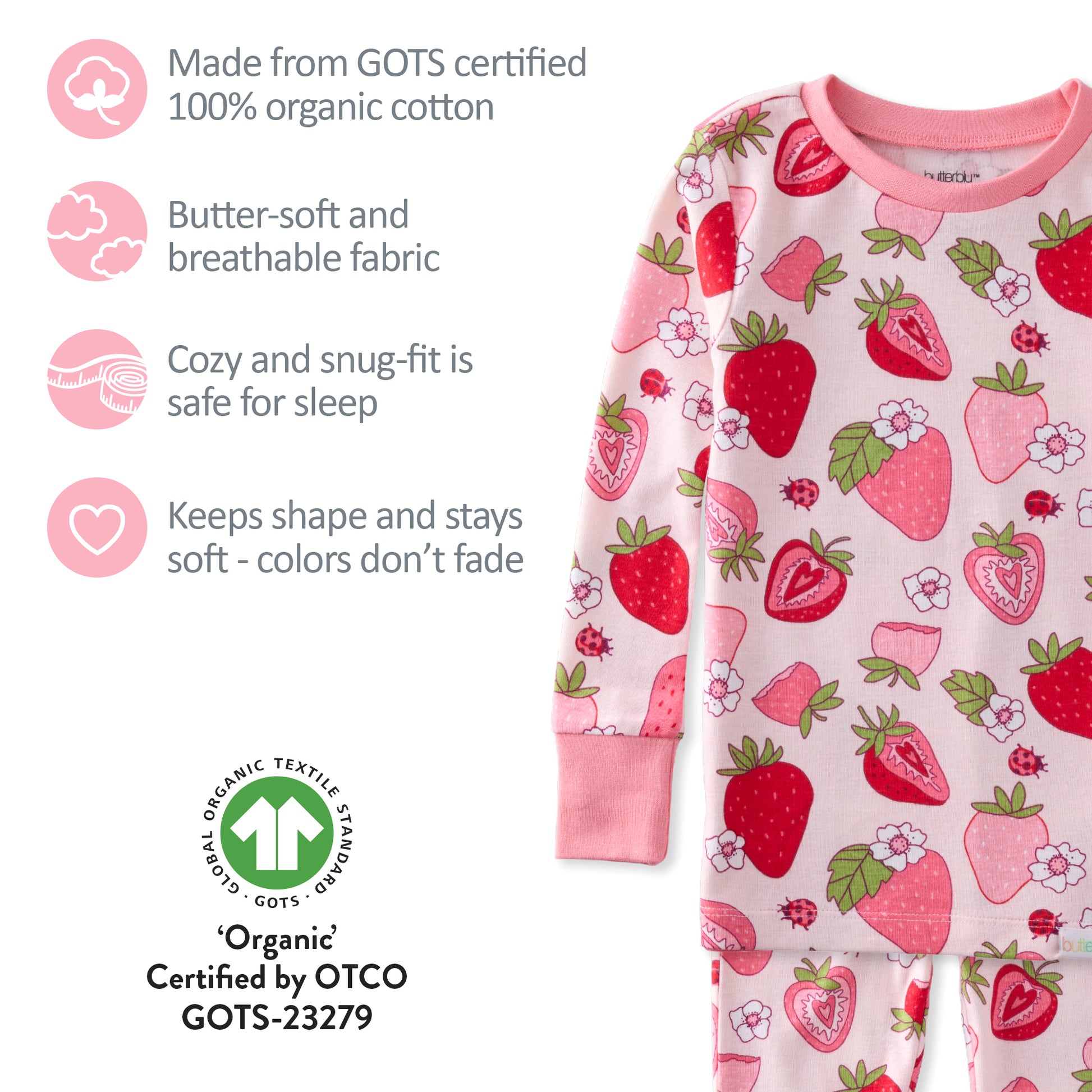 Children's pajamas with strawberry pattern on a white background, featuring GOTS certification.