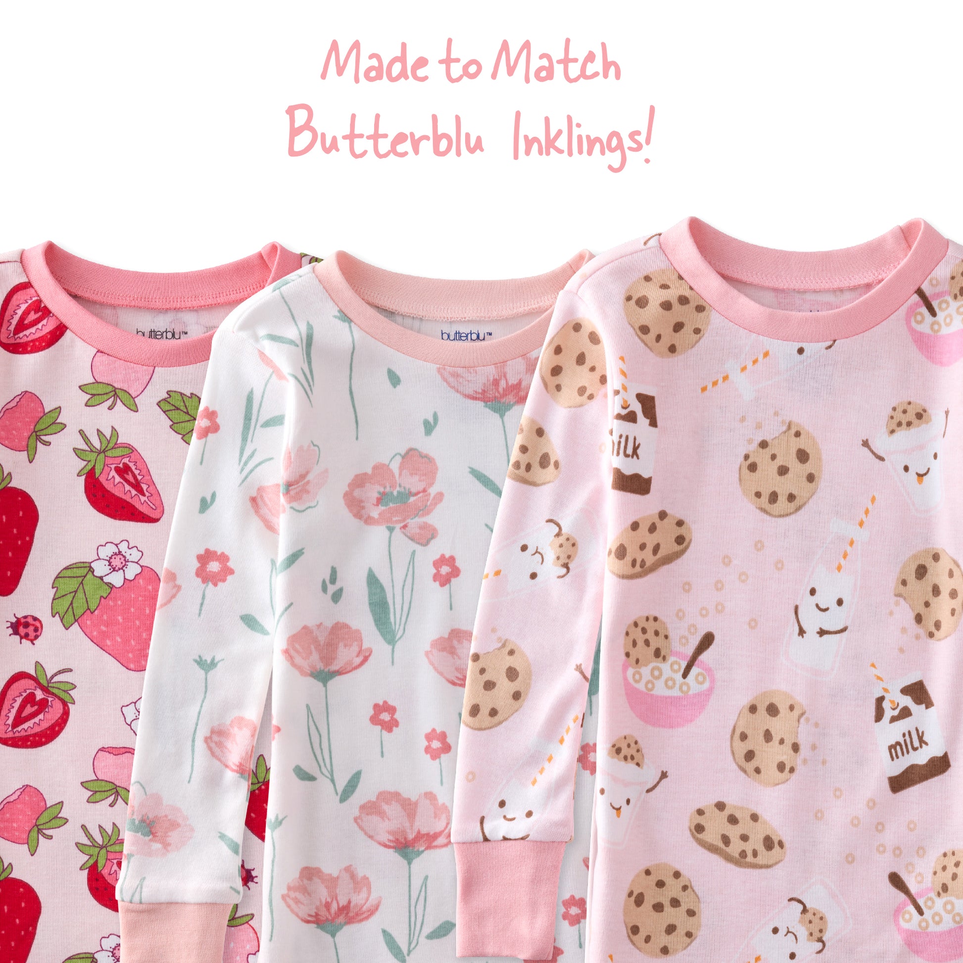 Three children's pajamas with different patterns on a white background.