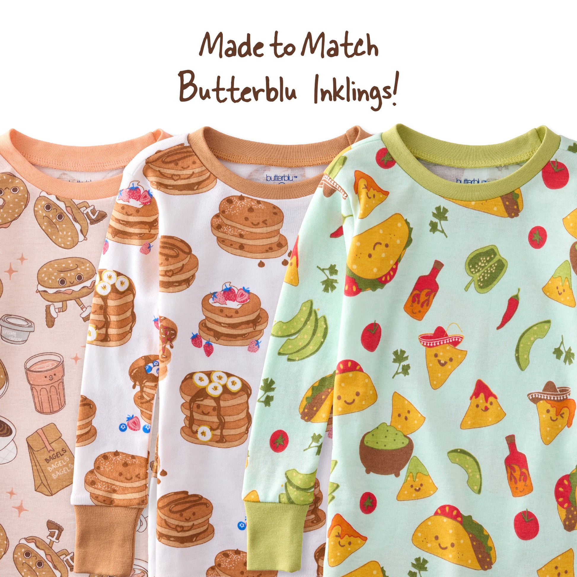 Three baby rompers with food-themed patterns on a white background.