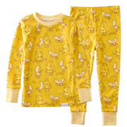 Yellow pajama set with cartoon cheese and banana pattern on a white background