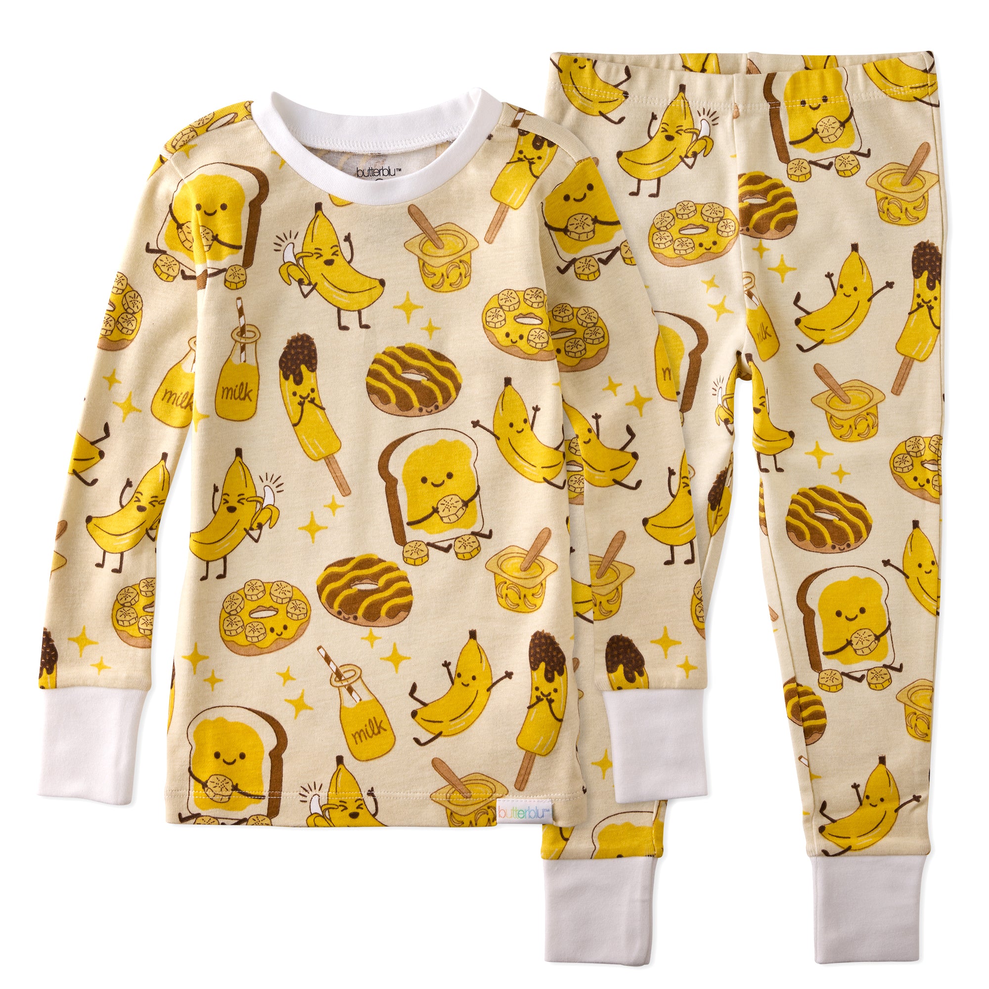Children's pajama set with banana and toast pattern on a beige background