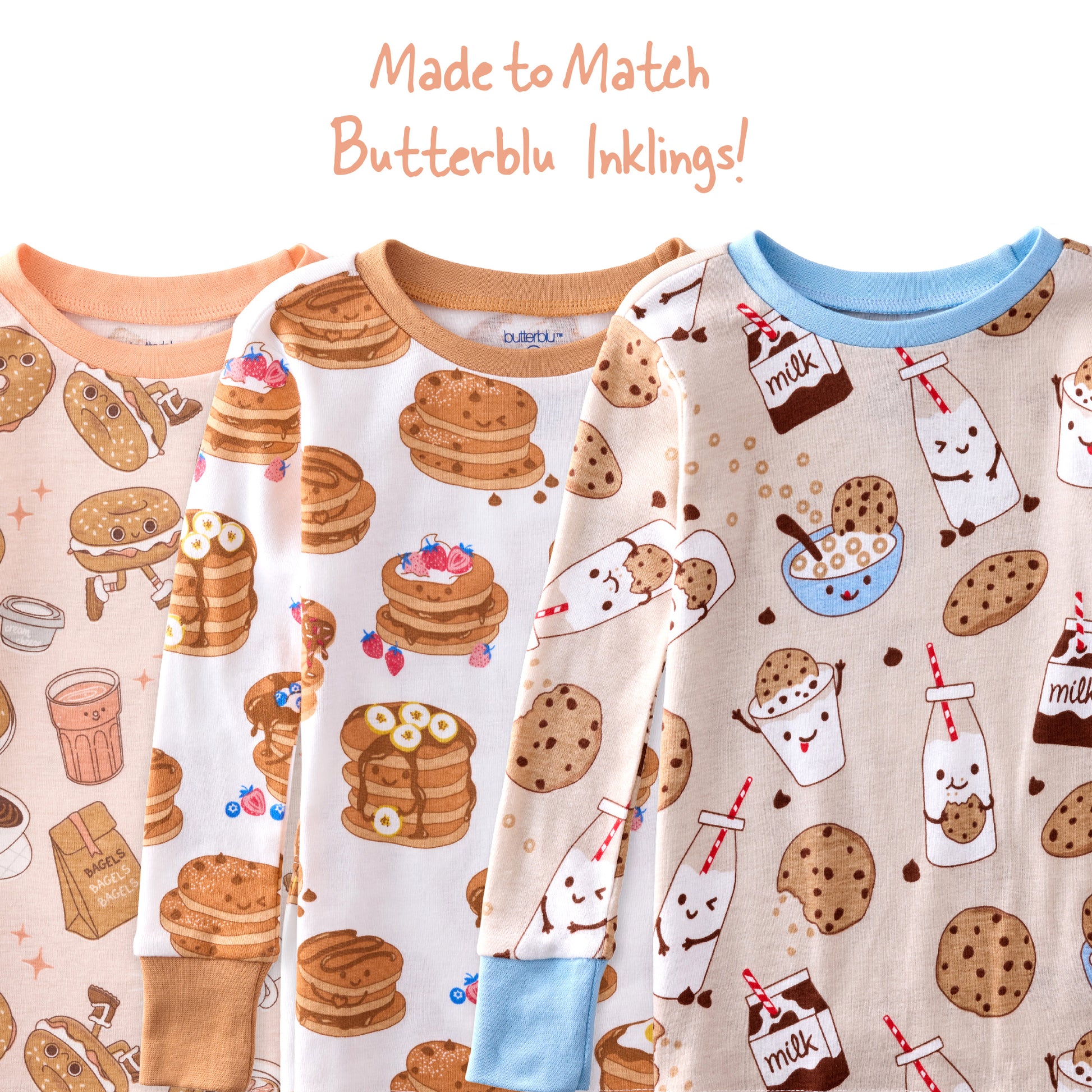 Three children's pajamas with breakfast-themed patterns on a beige background.