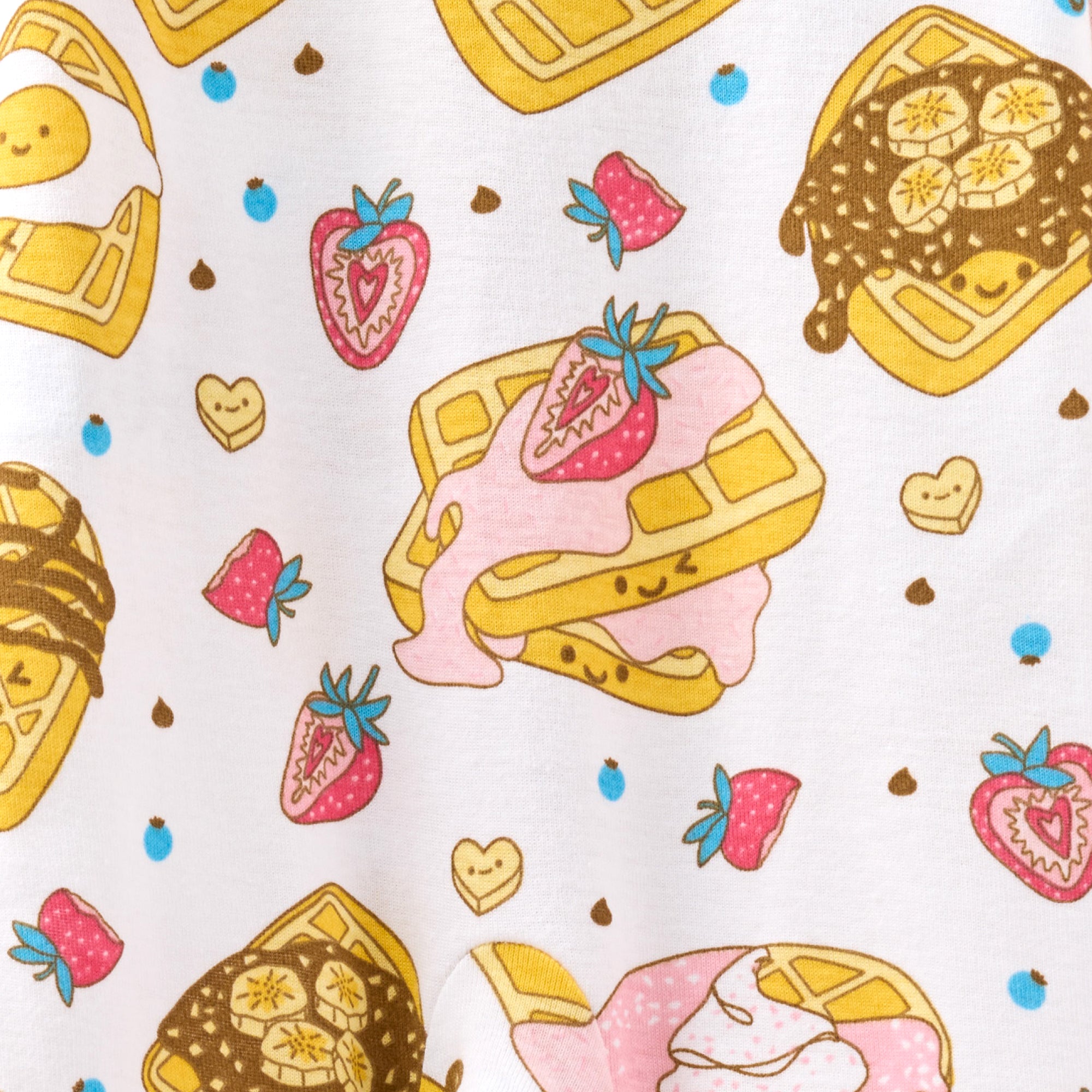 Pattern of waffles with ice cream and strawberries on a light background