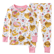 Children's pajama set with waffle and strawberry pattern on a white background