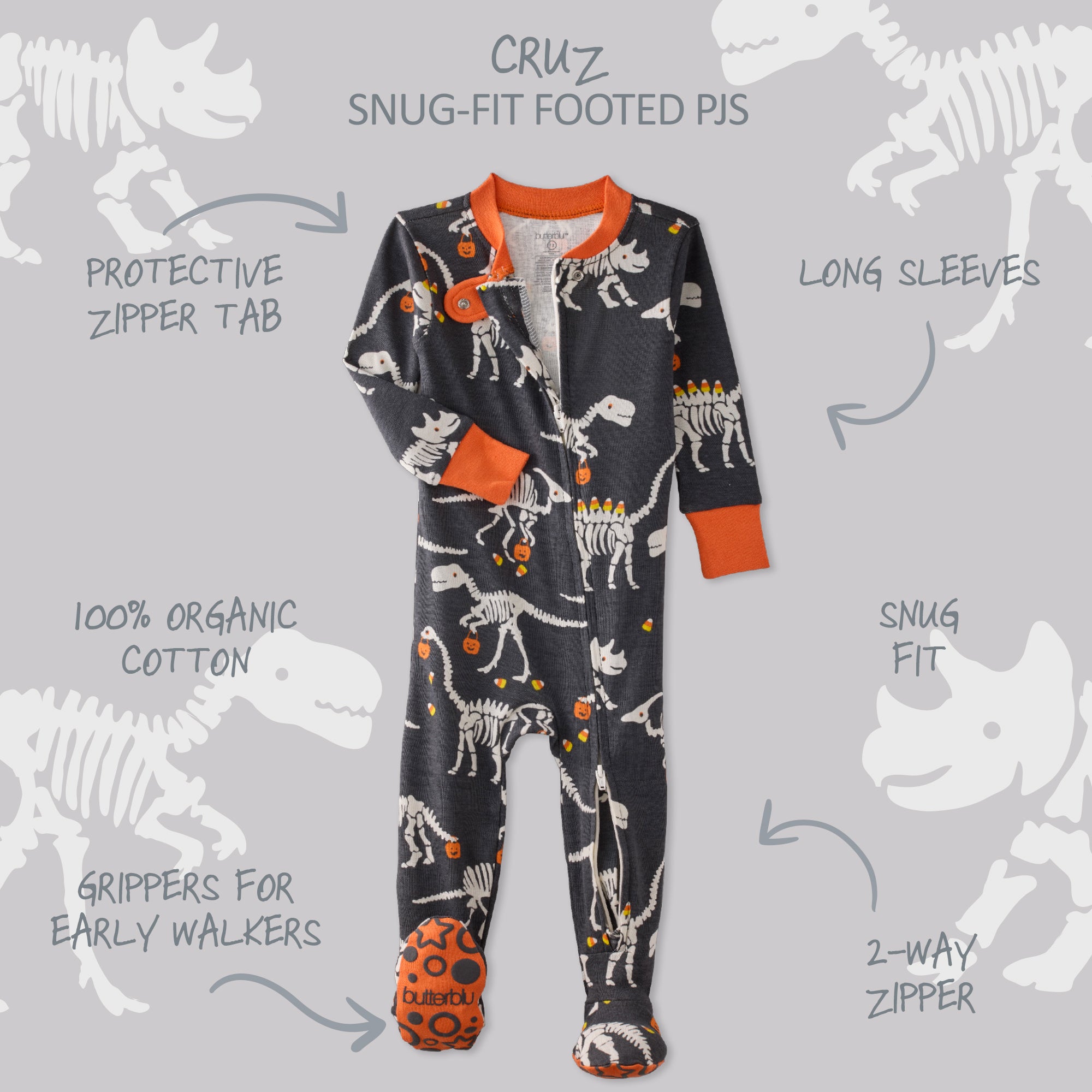 Children's onesie with dinosaur pattern on a gray background with text detailing features.