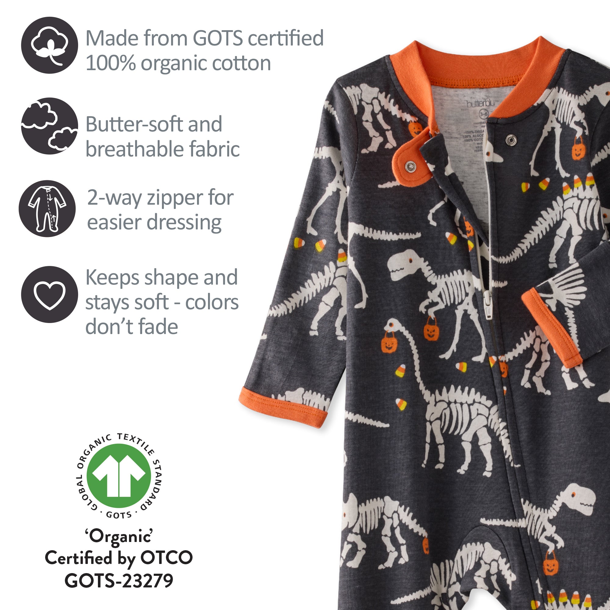Children's jacket with dinosaur skeleton pattern on a white background, featuring GOTS certification details.