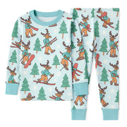 Children's pajama set with skiing moose on a white background
