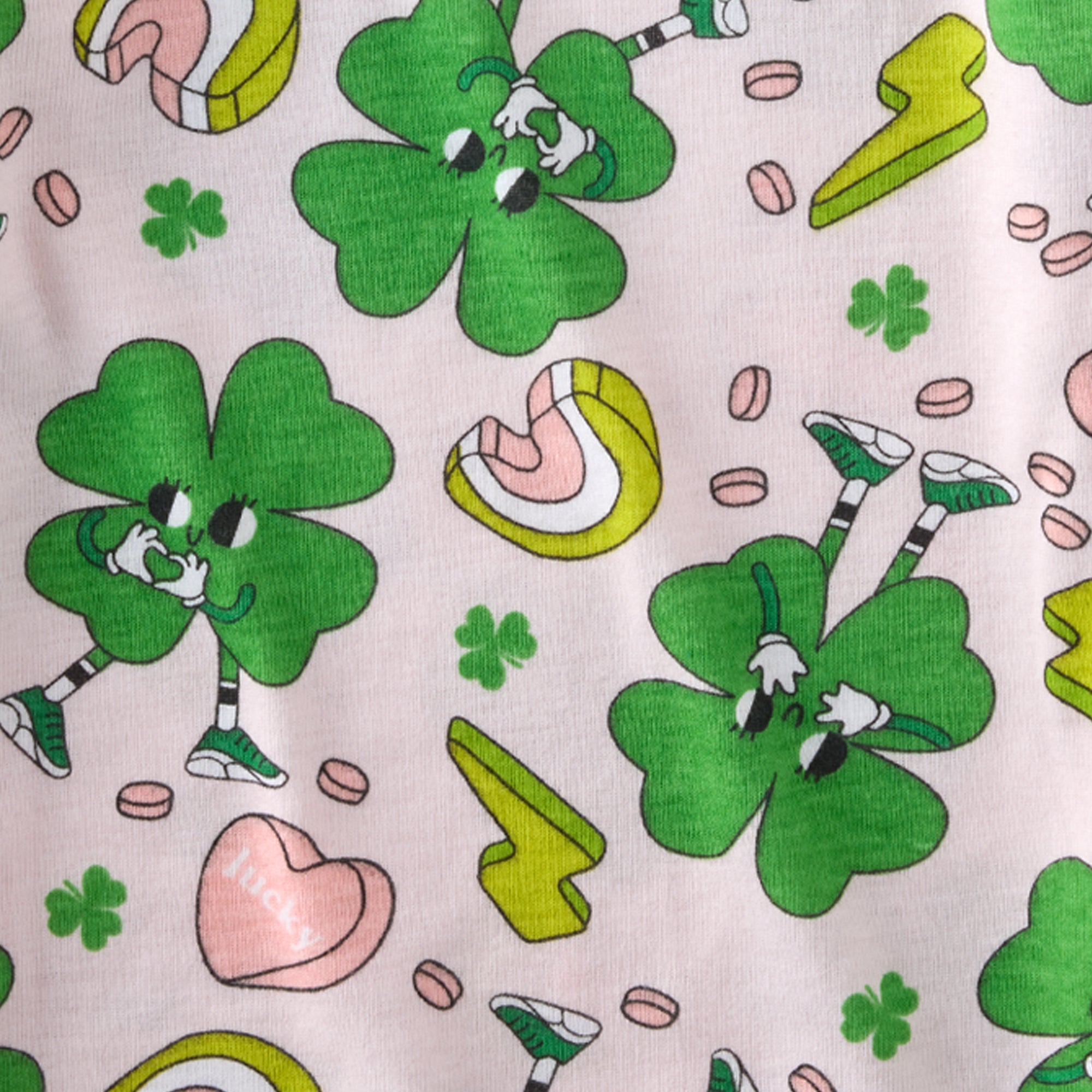 Pattern of cartoonish green clovers and pink hearts on a light background