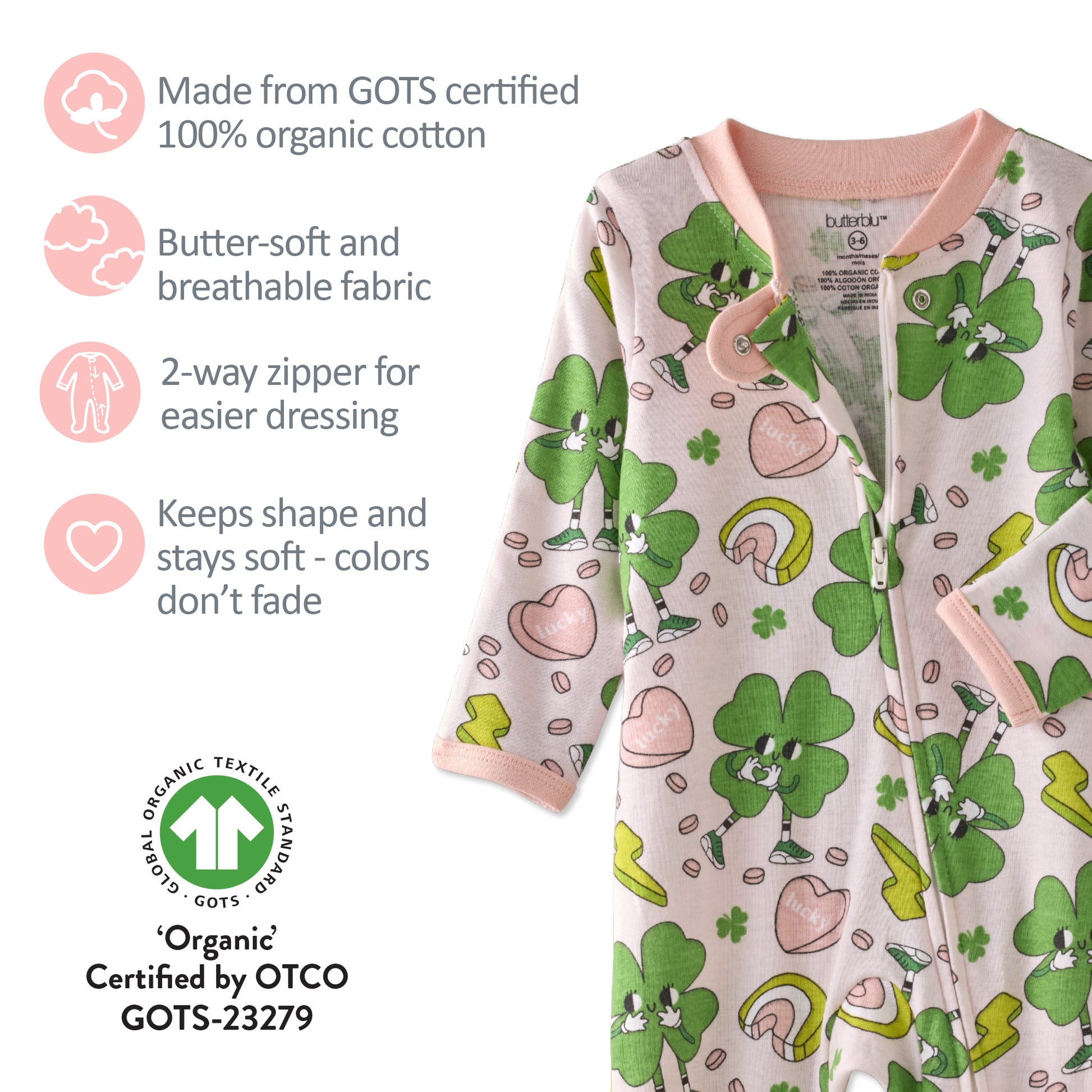 Baby onesie with green and pink designs on a white background, featuring organic cotton certification.