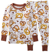 Children's pajama set with pretzel pattern on a white background